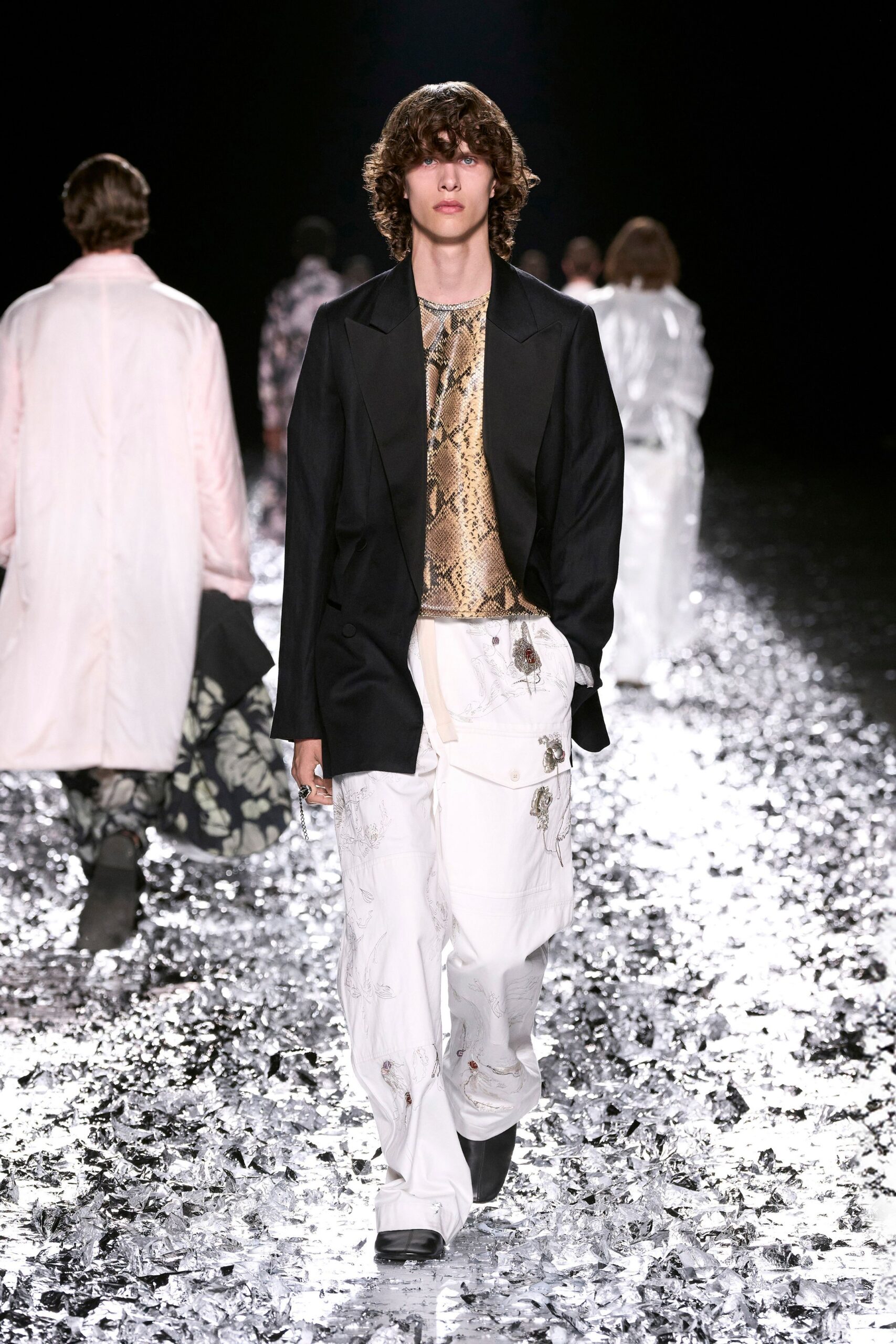 black blazer gold printed top white pants