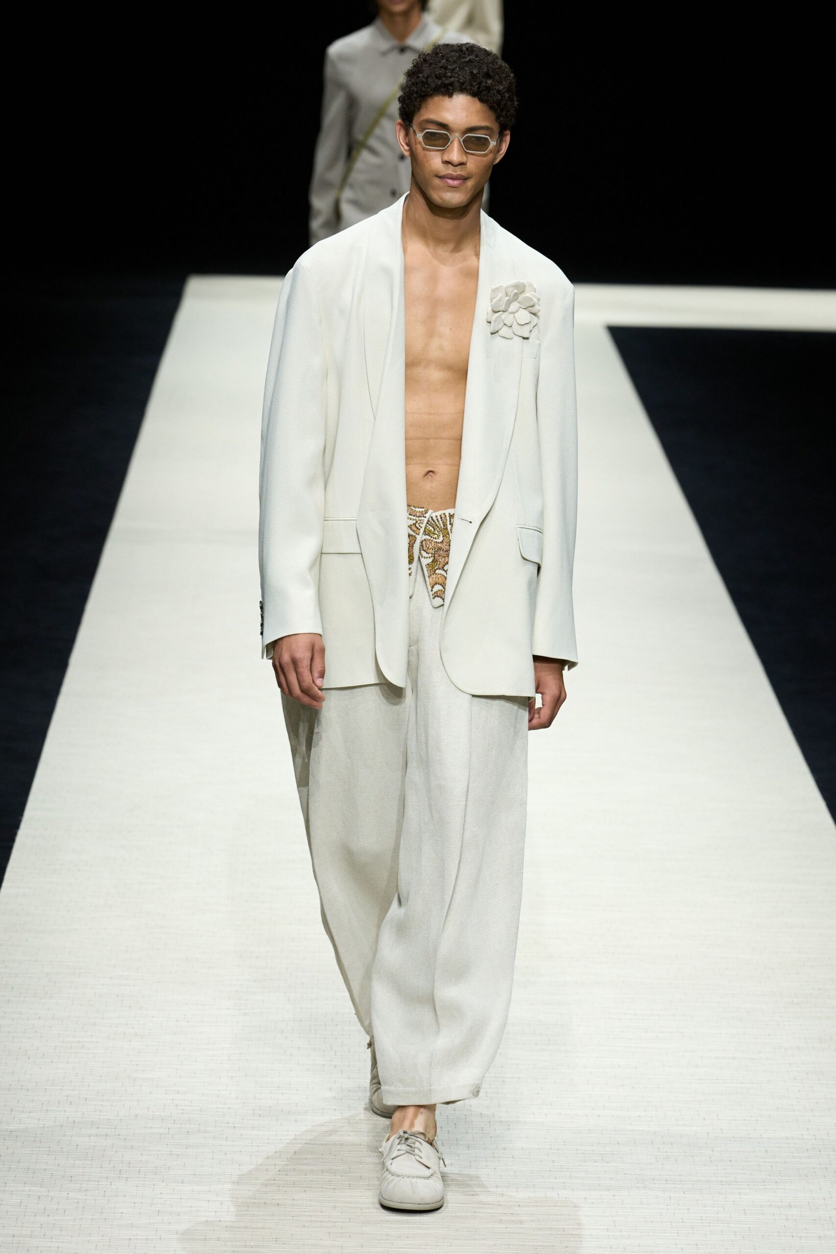 white tailored blazer with beige pants