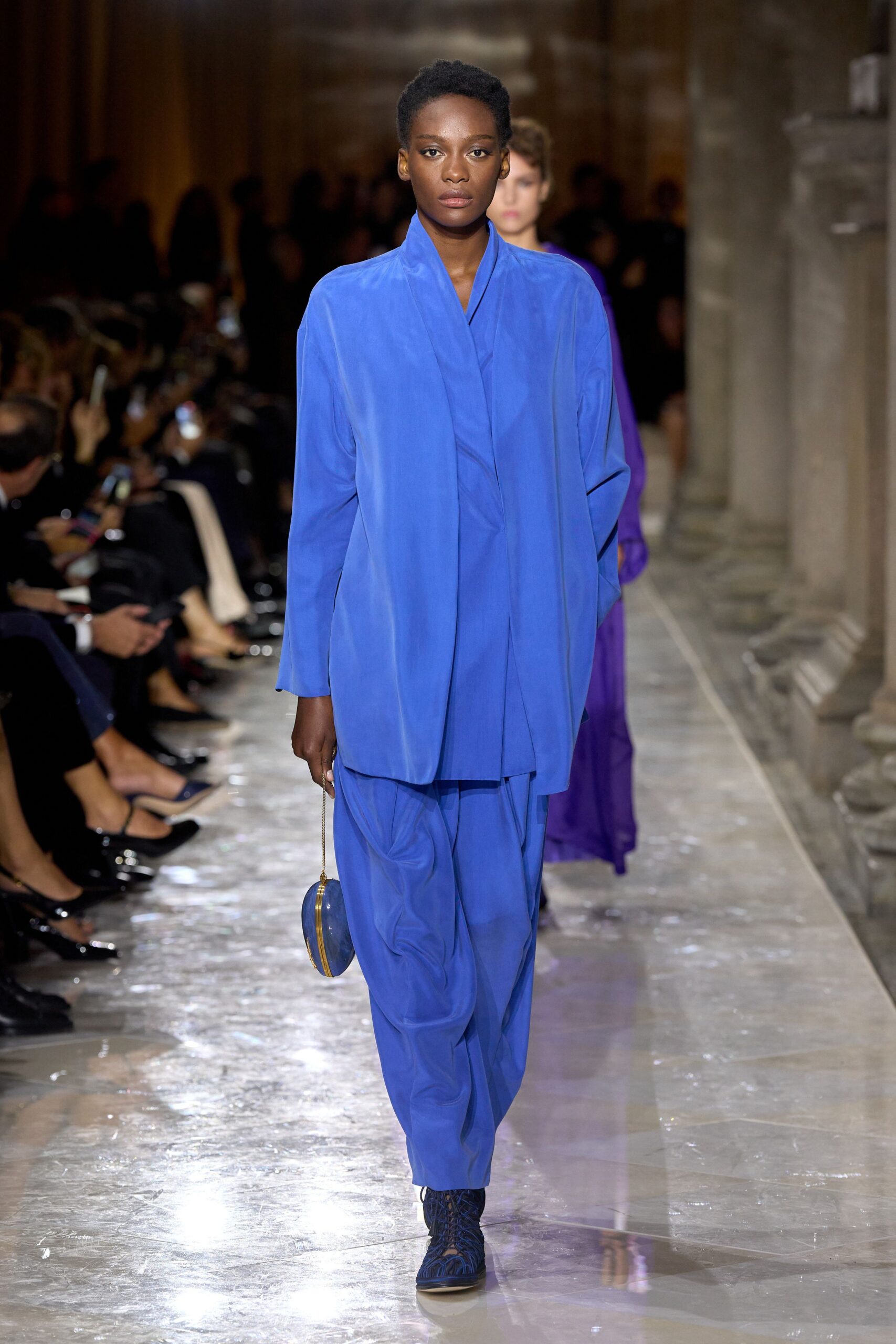 blue relaxed suit with bag