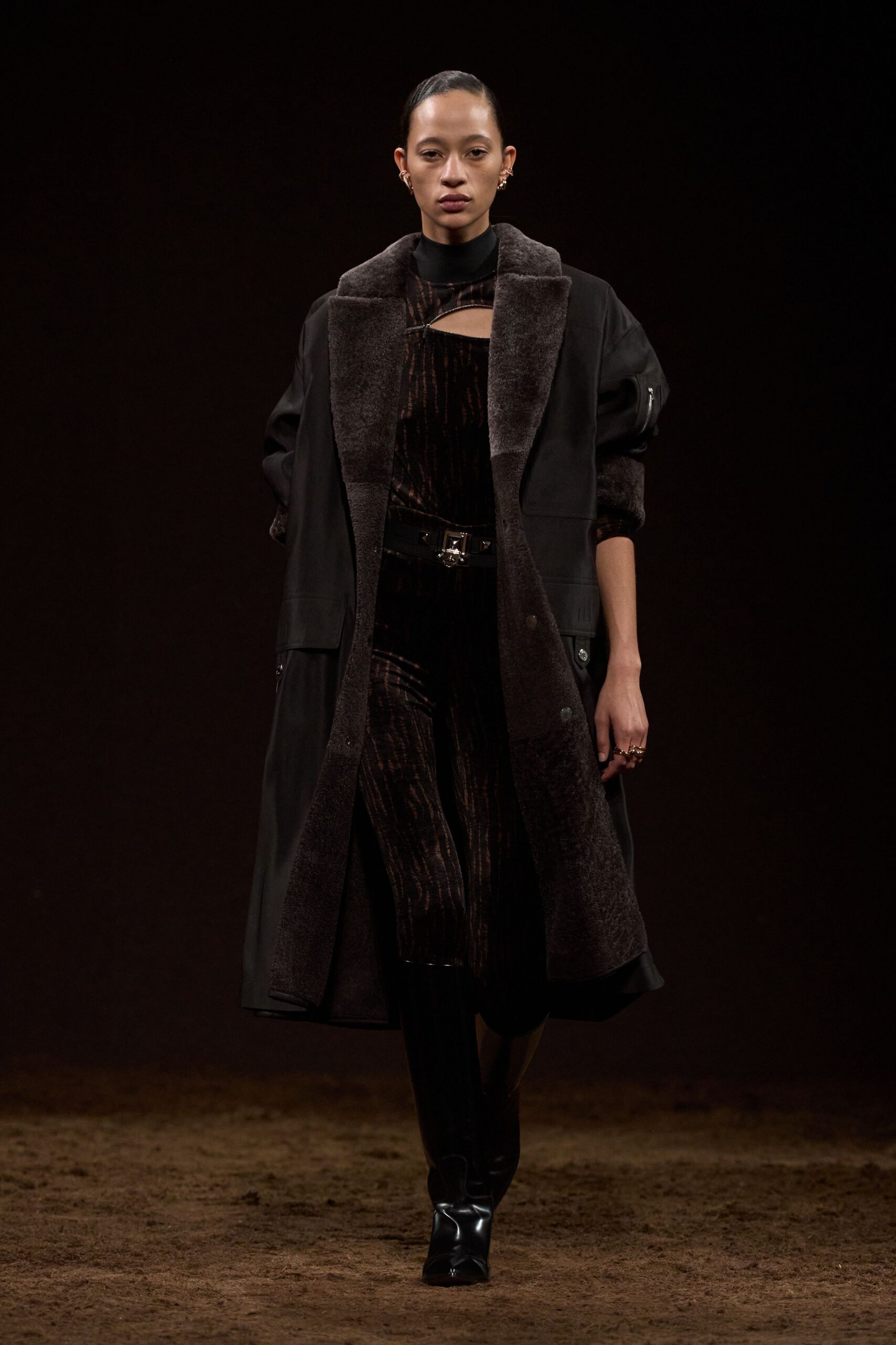 black faux-fur coat and velvet dress
