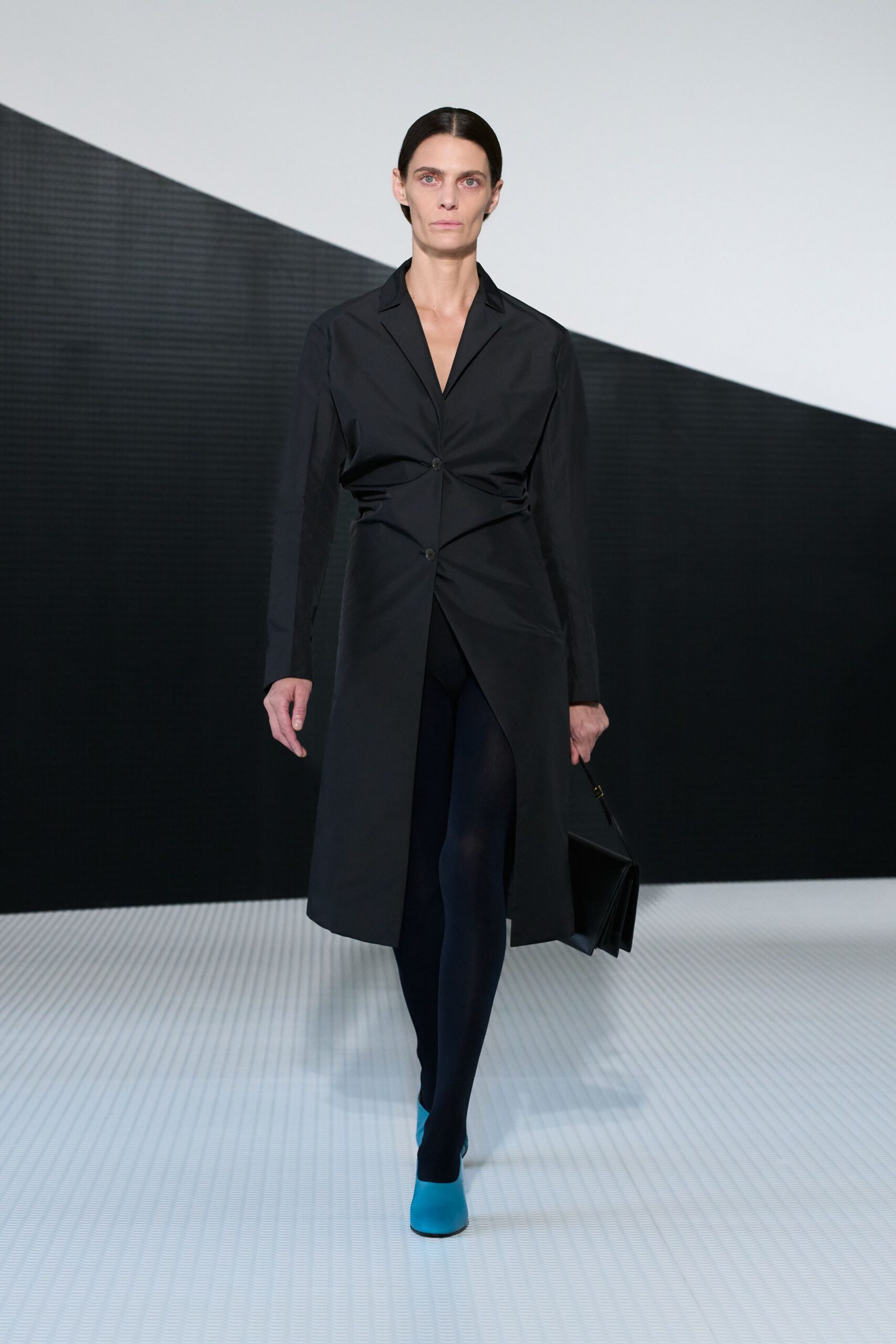 black shirt-dress with blue shoes