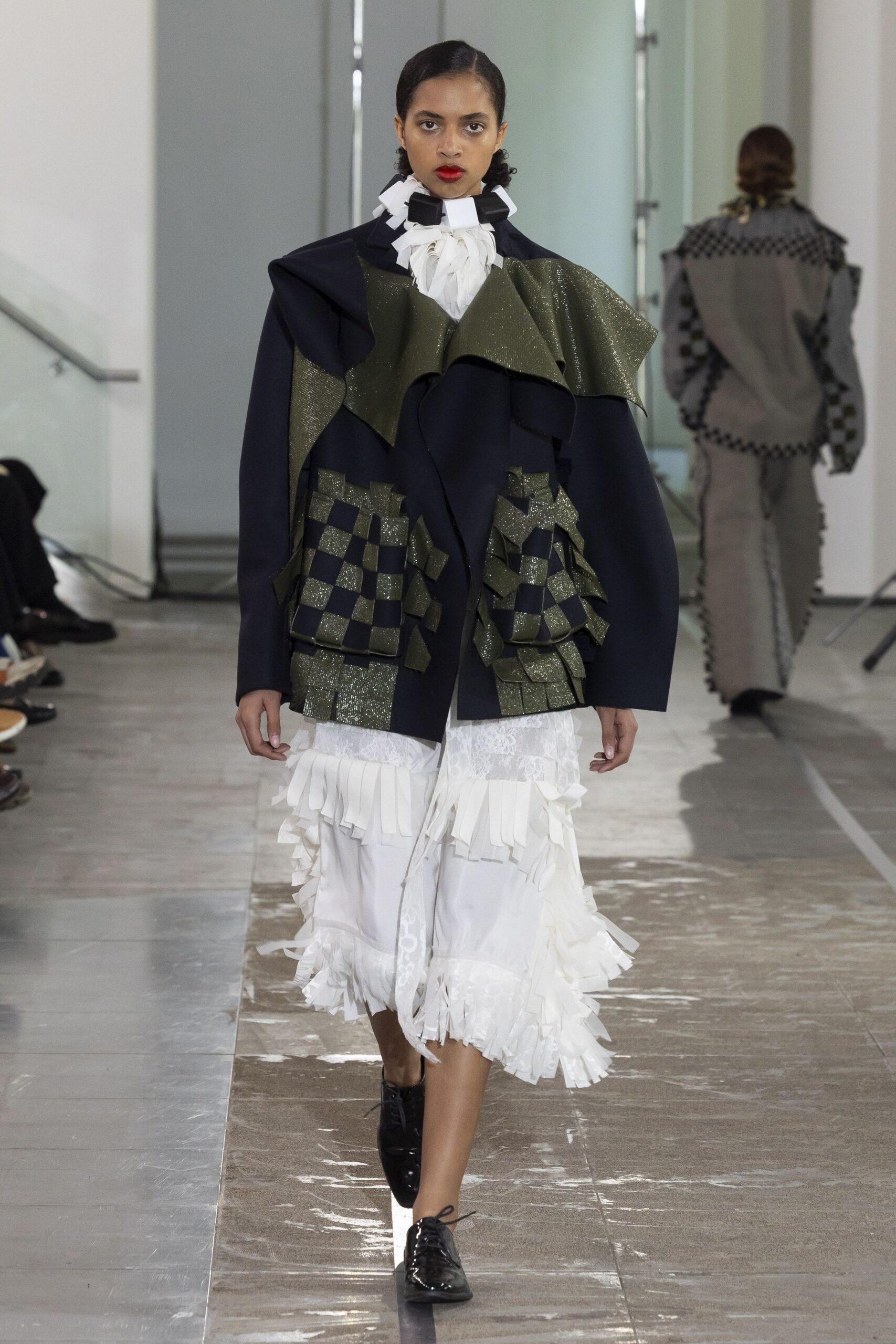 black cotton long-sleeve structured layered pleated coat
