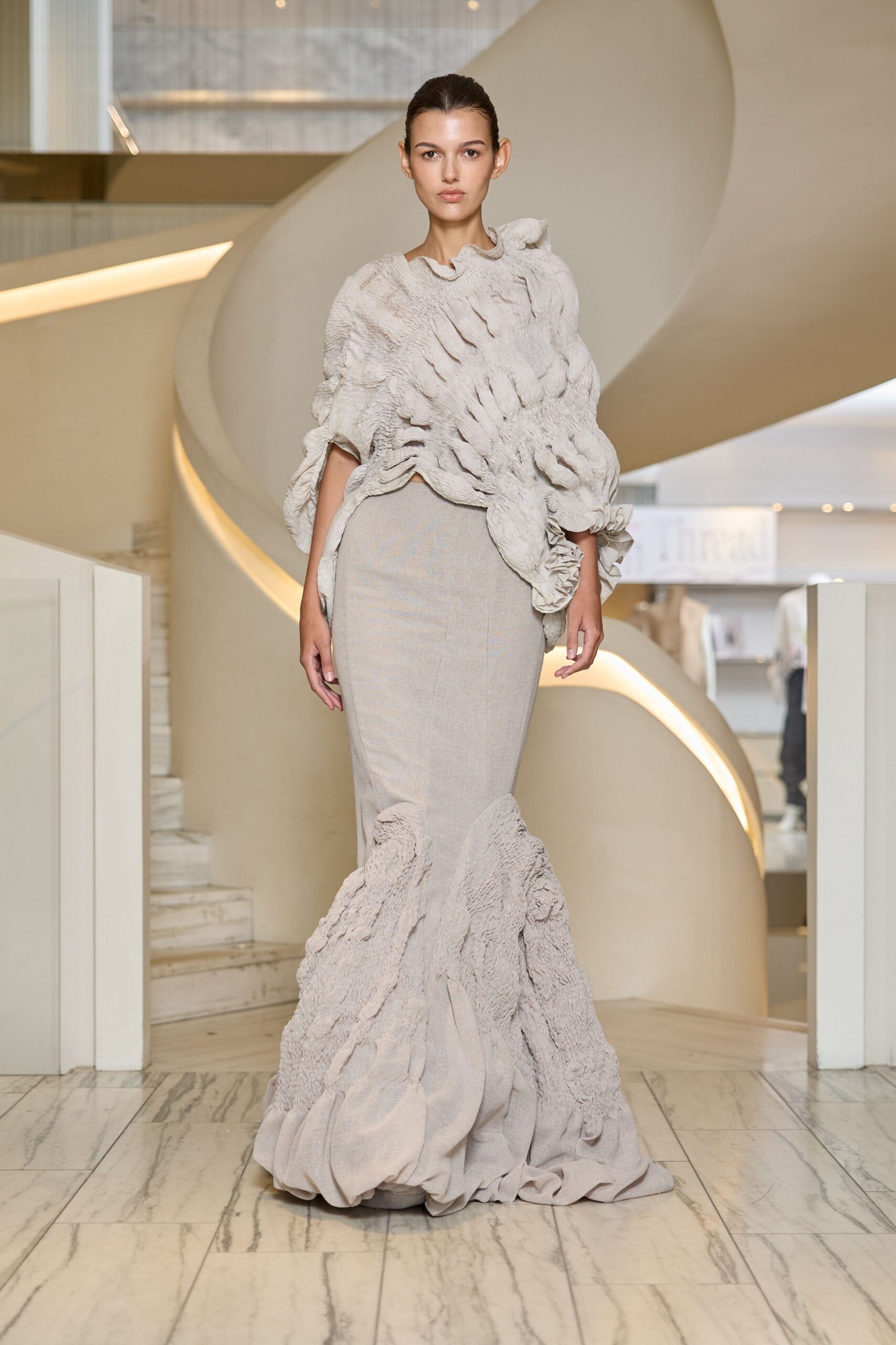 beige fitted ruffled gown