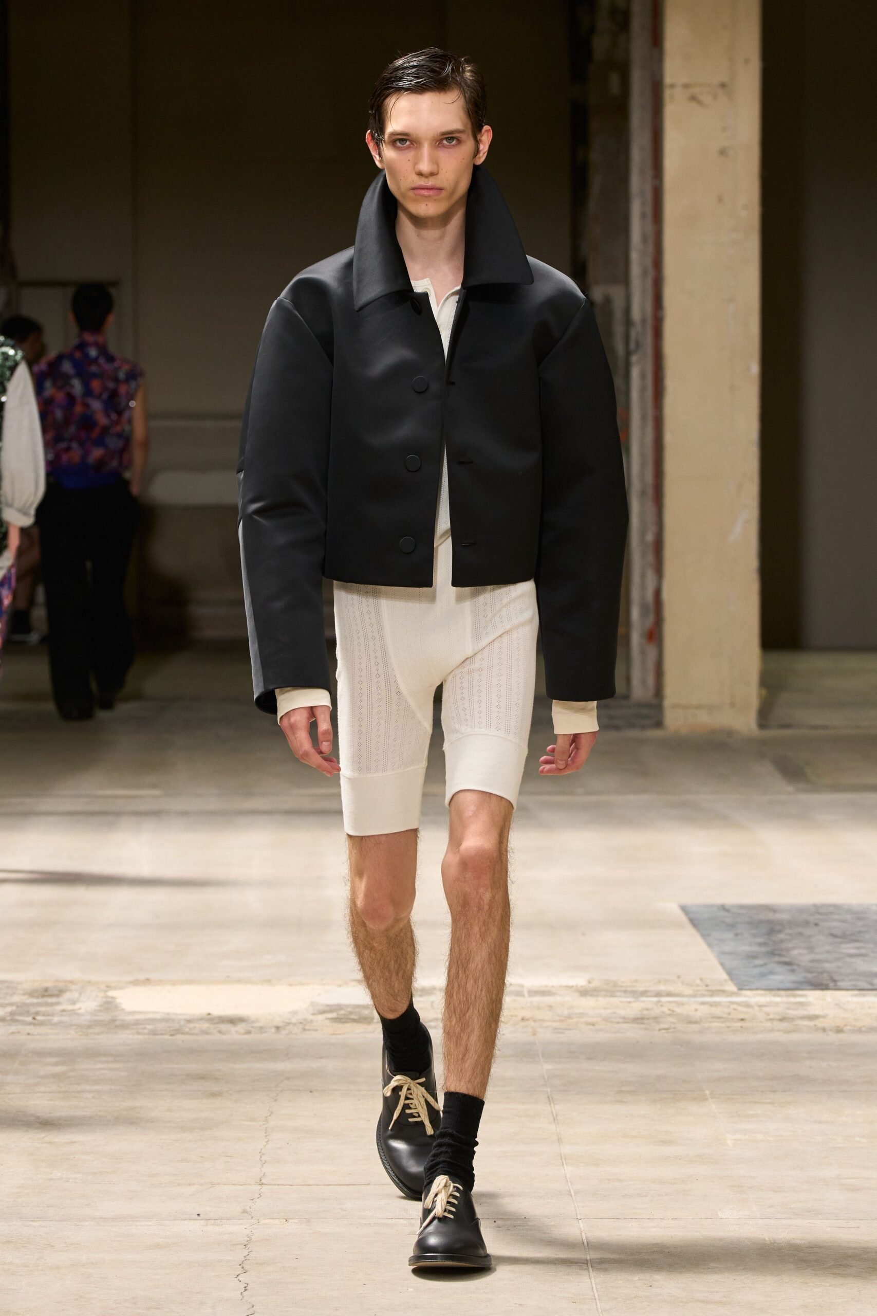 black neoprene long-sleeve collared structured jacket