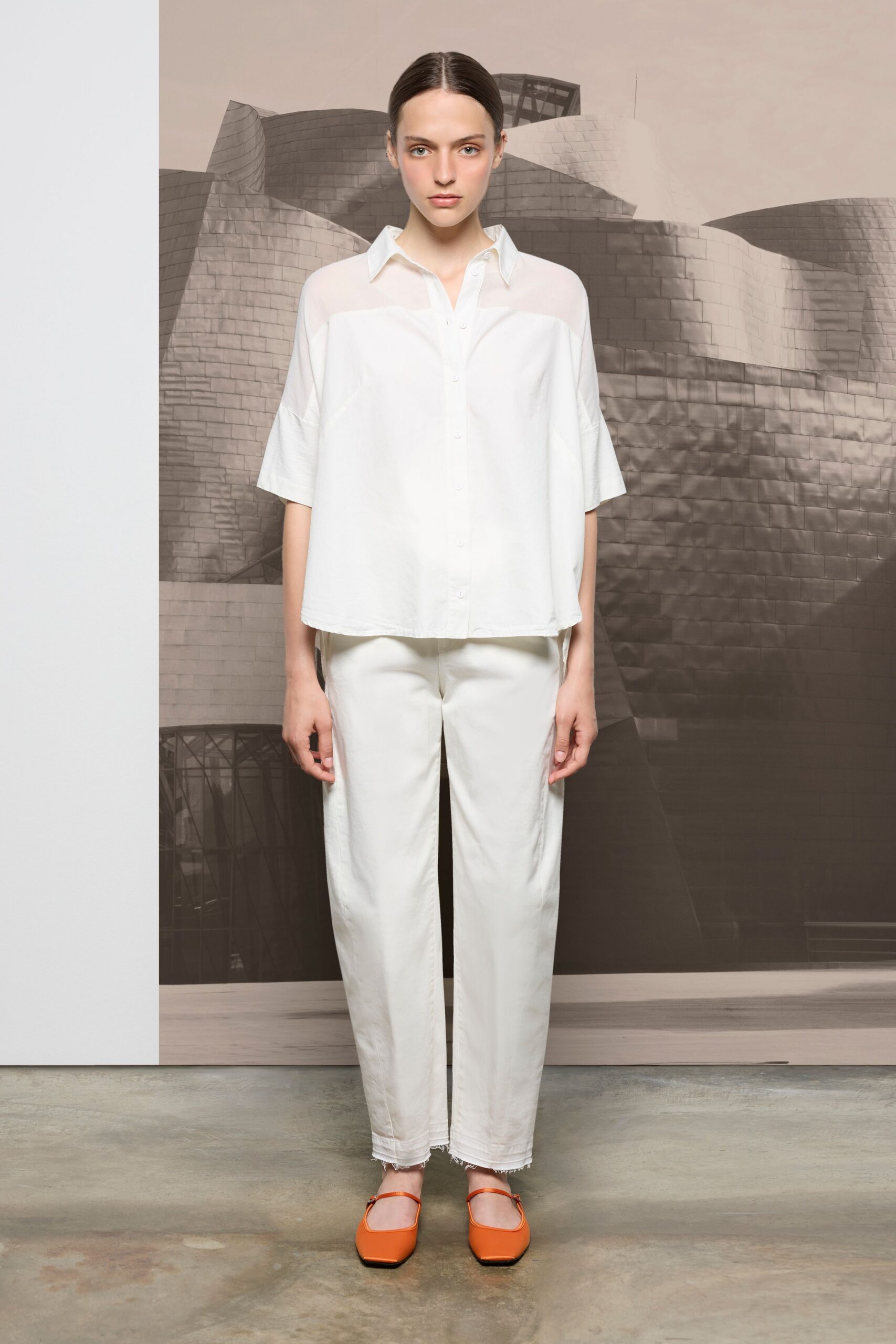 white relaxed shirt and pants