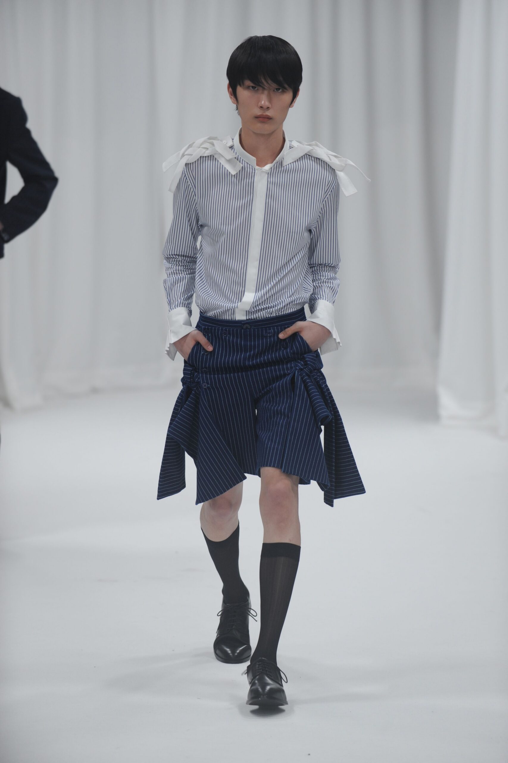 striped shirt and pleated skirt