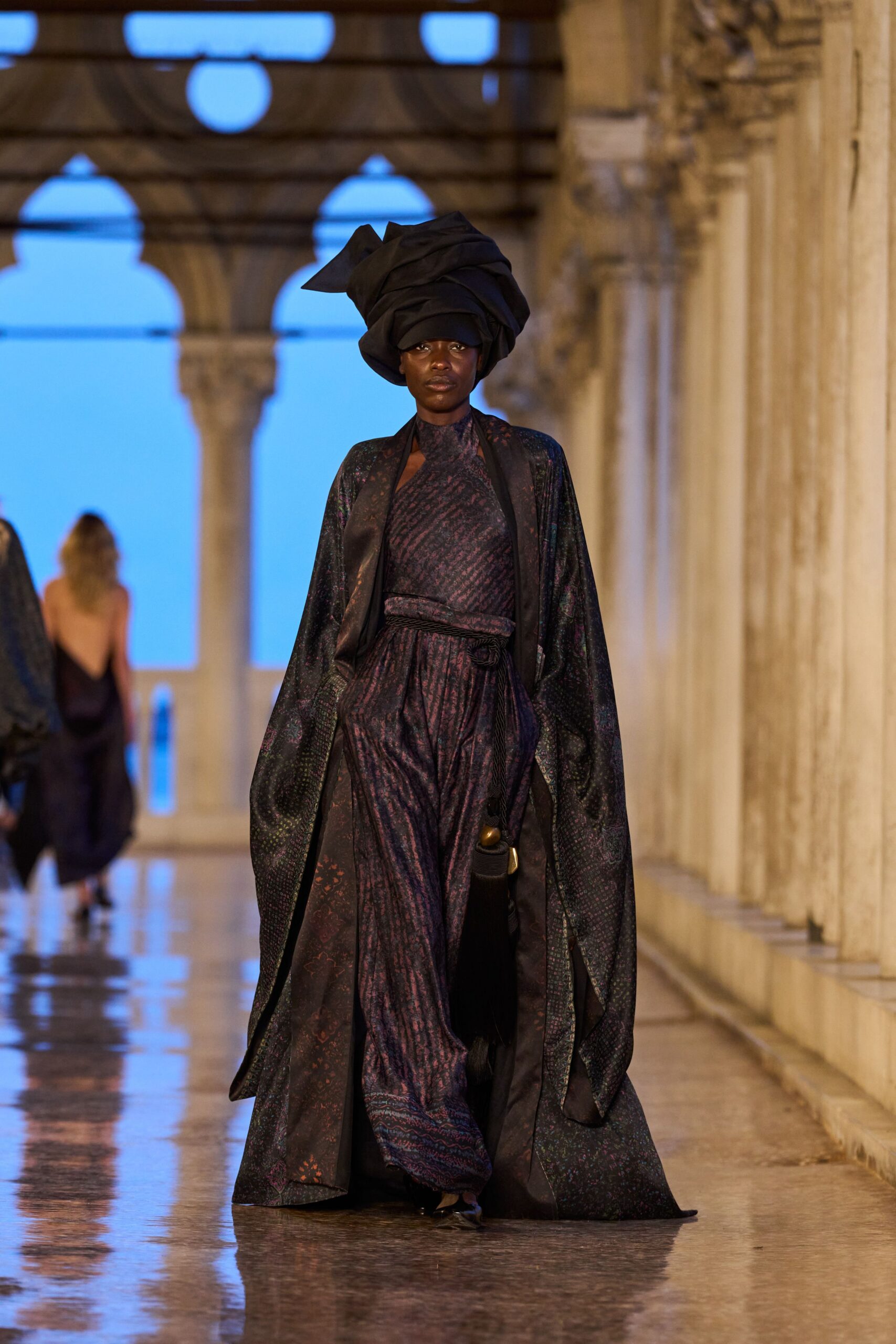 black silk jumpsuit with cape