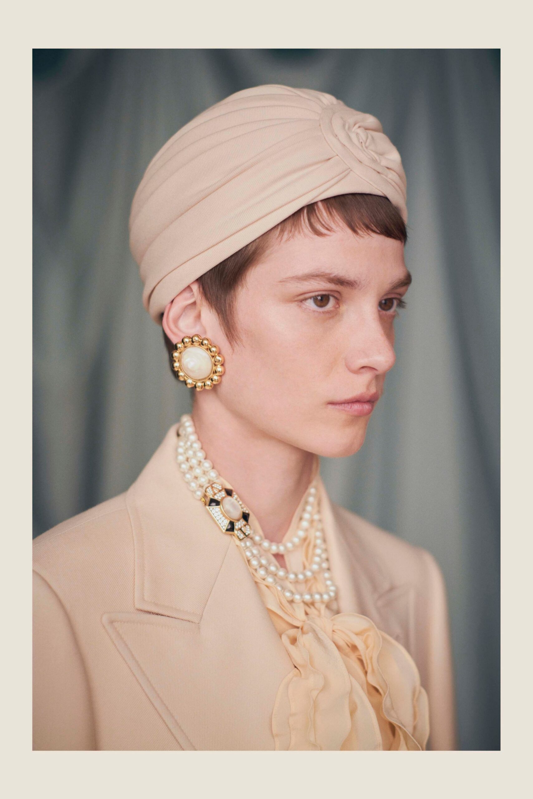 beige silk long-sleeve collared tailored buttoned blazer
