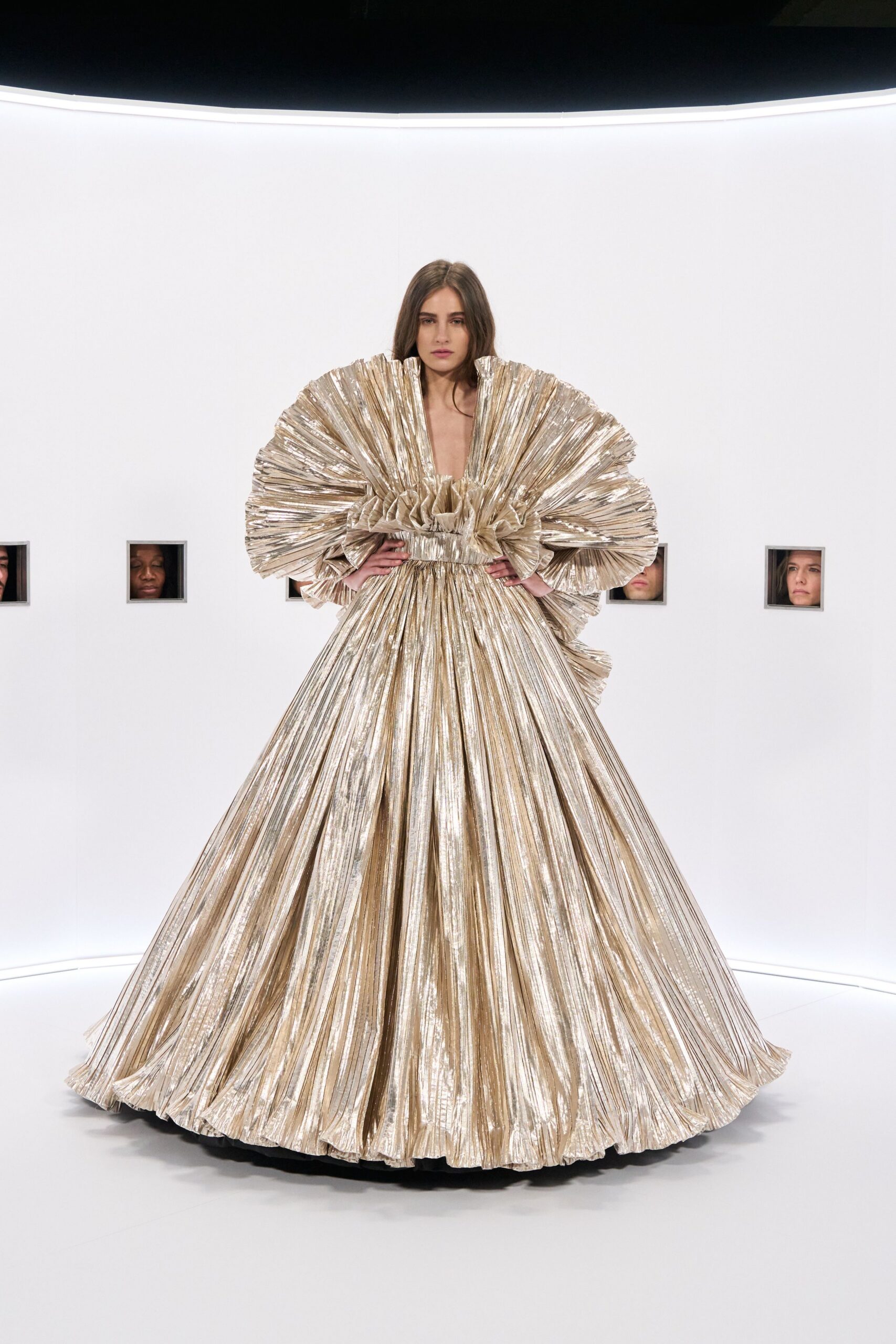 gold pleated long-sleeve gown