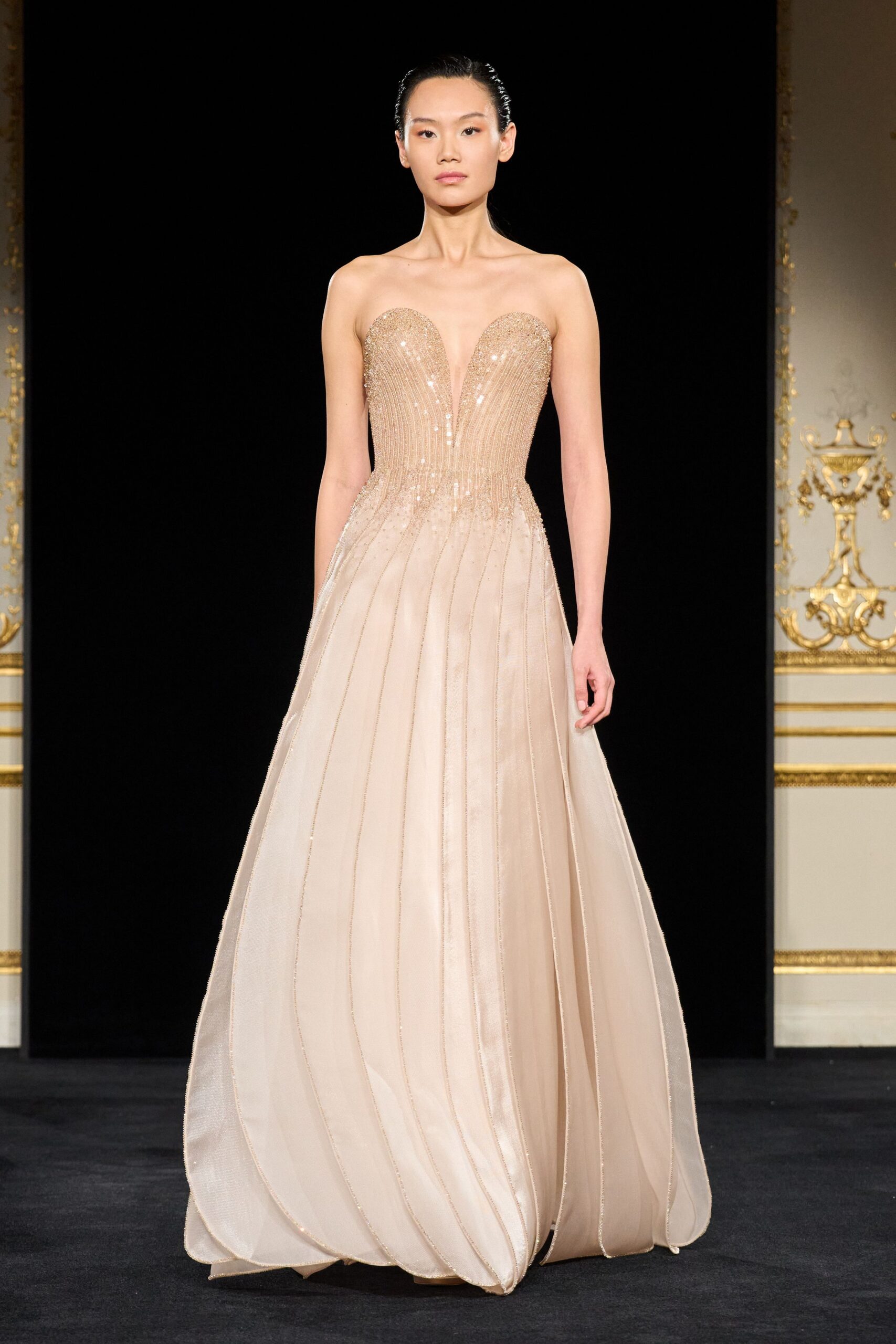 beige strapless pleated gown