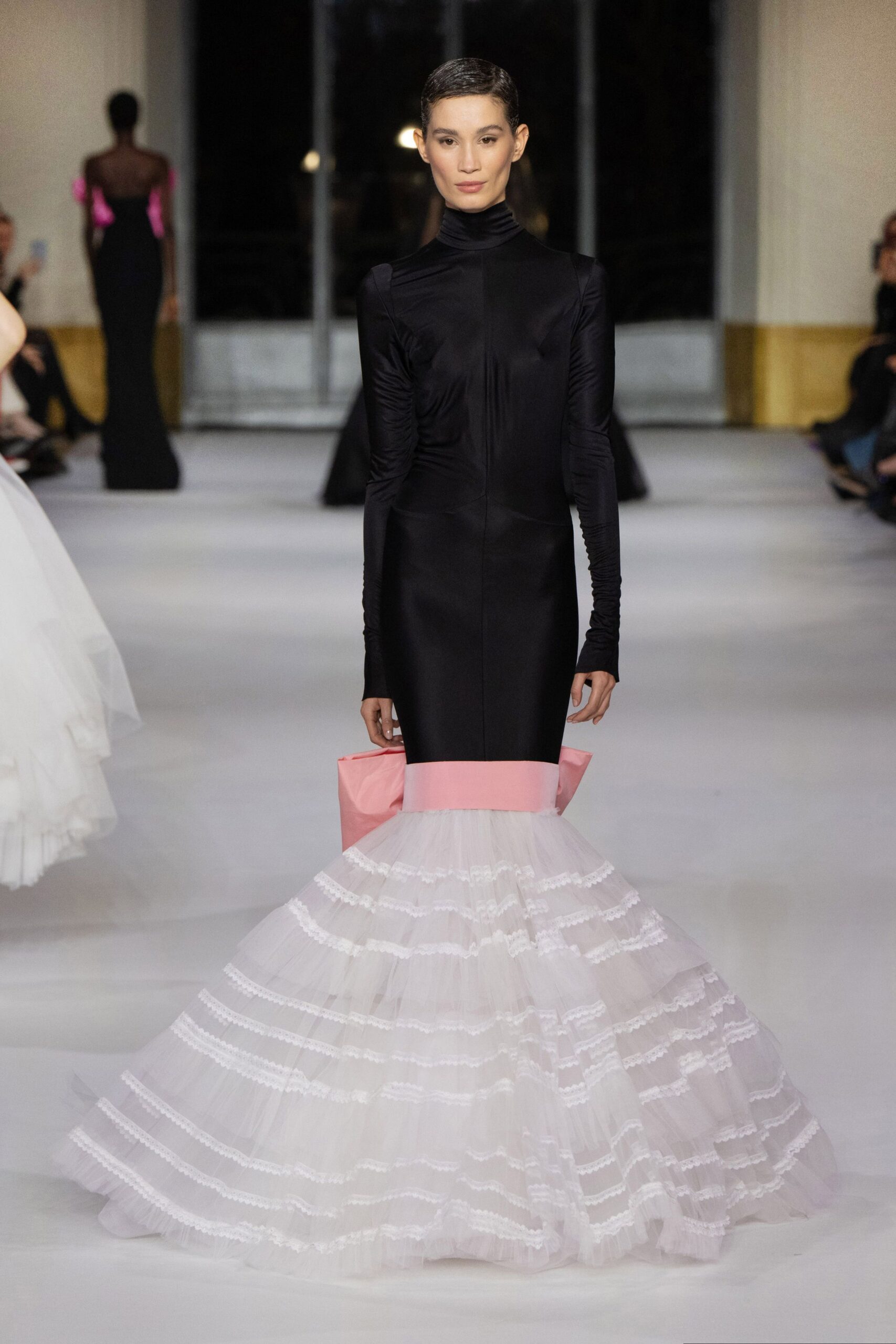 black silk gown with pleated skirt