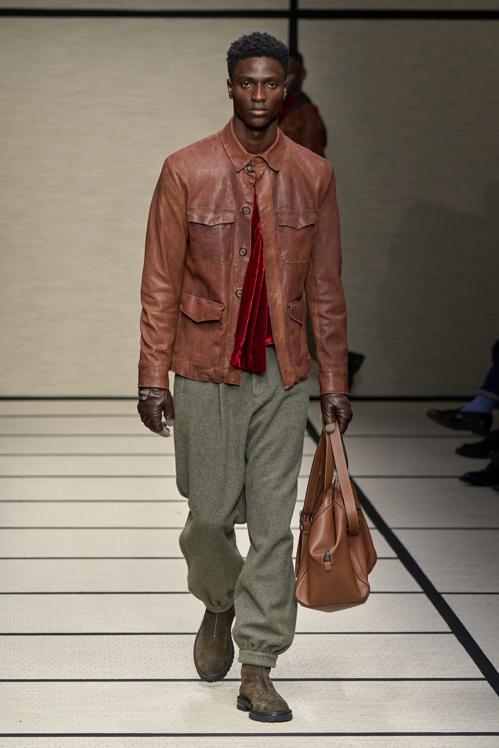 brown leather jacket with red shirt