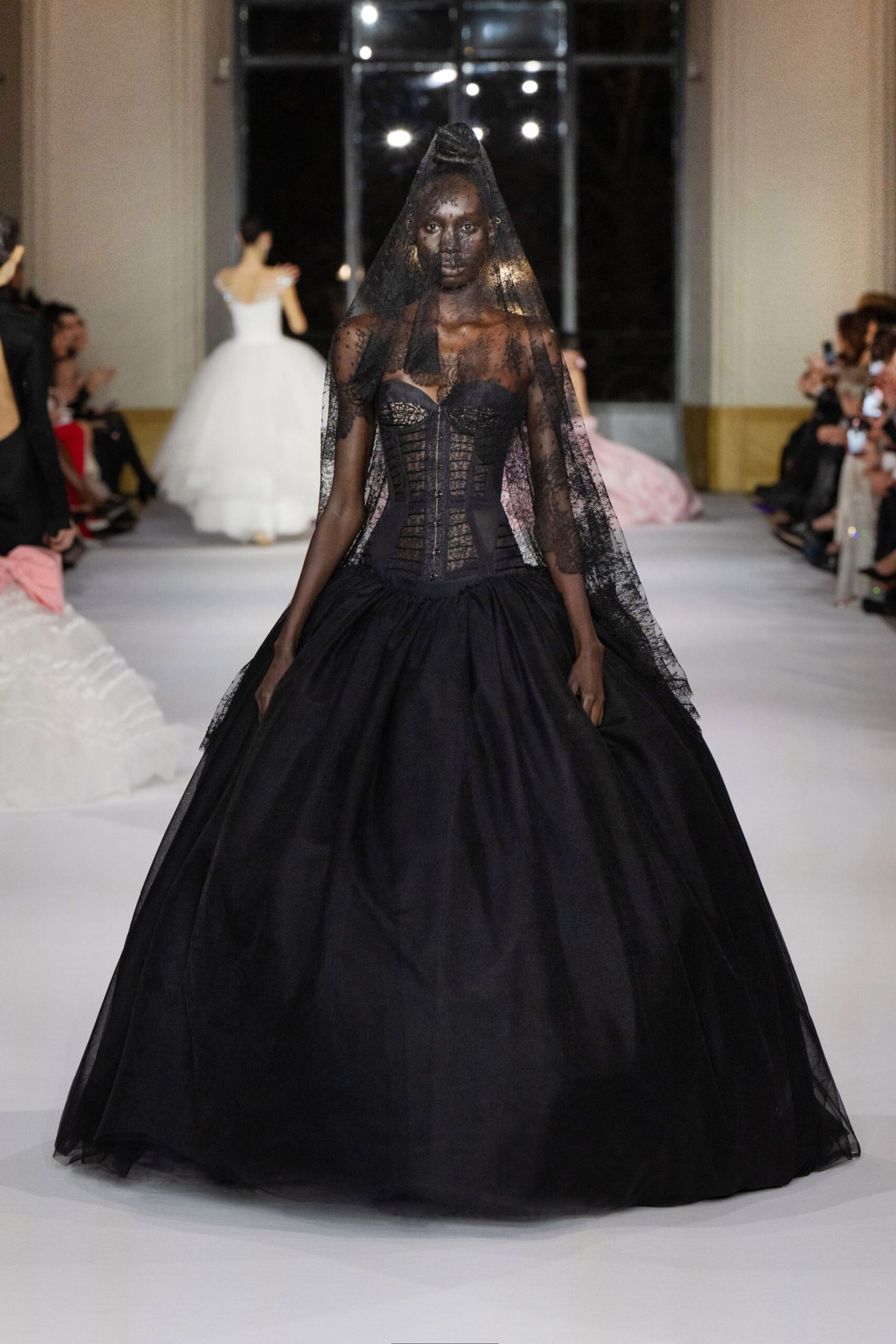 black strapless layered gown with veil