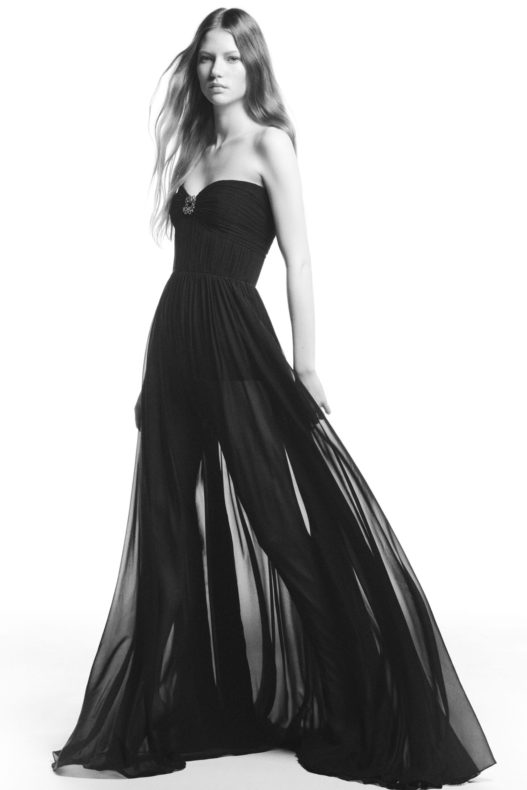 black strapless flowing gown