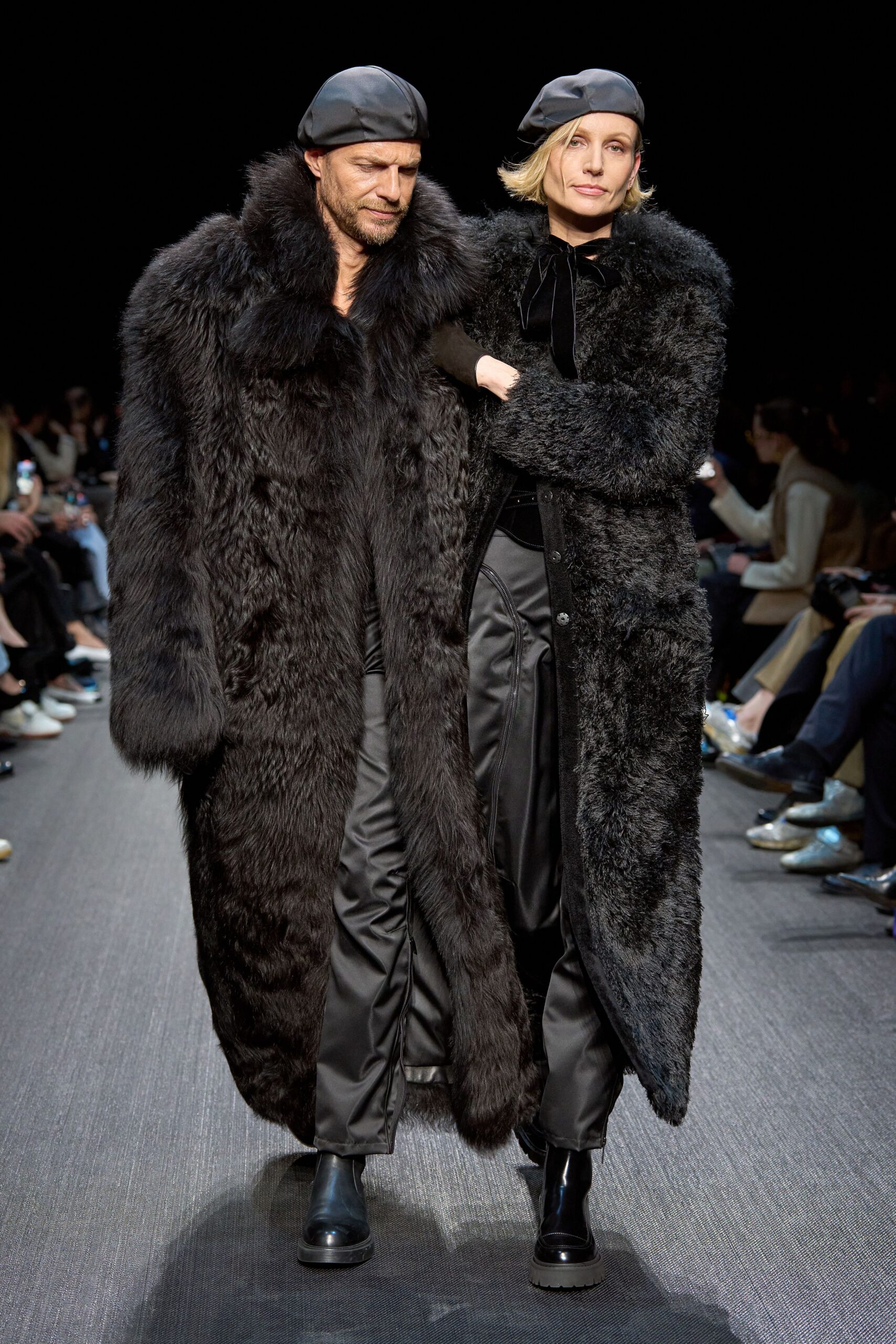 black fur coat and silk pants