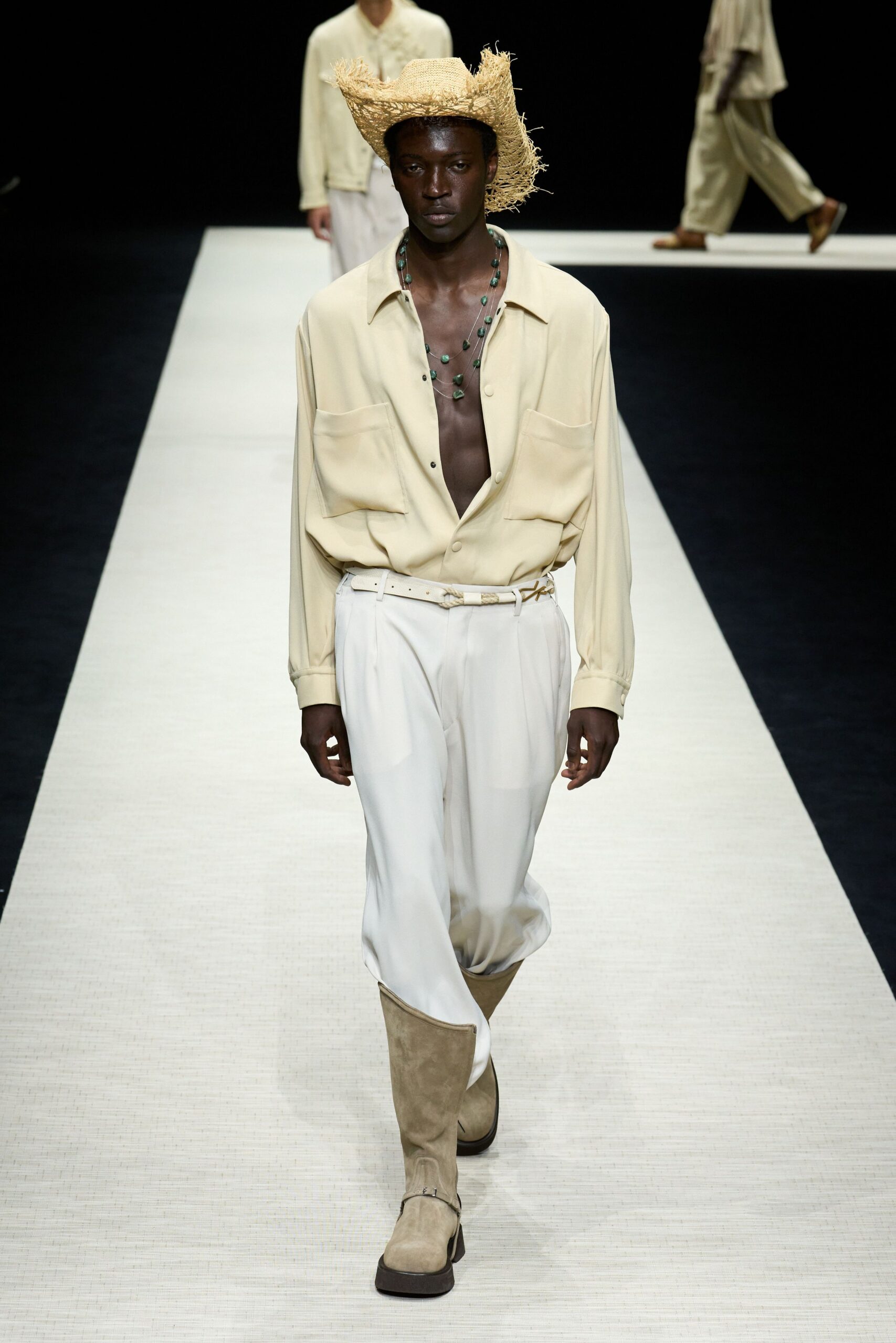beige shirt and white pants