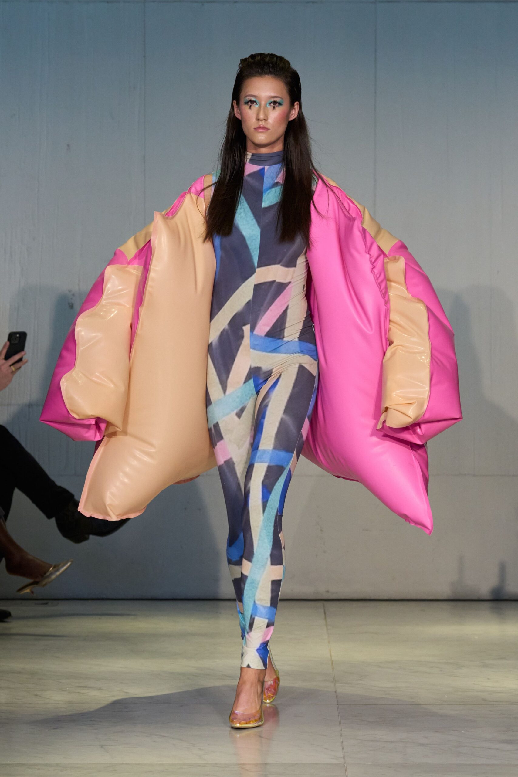 multi-colored neoprene catsuit with oversized coat