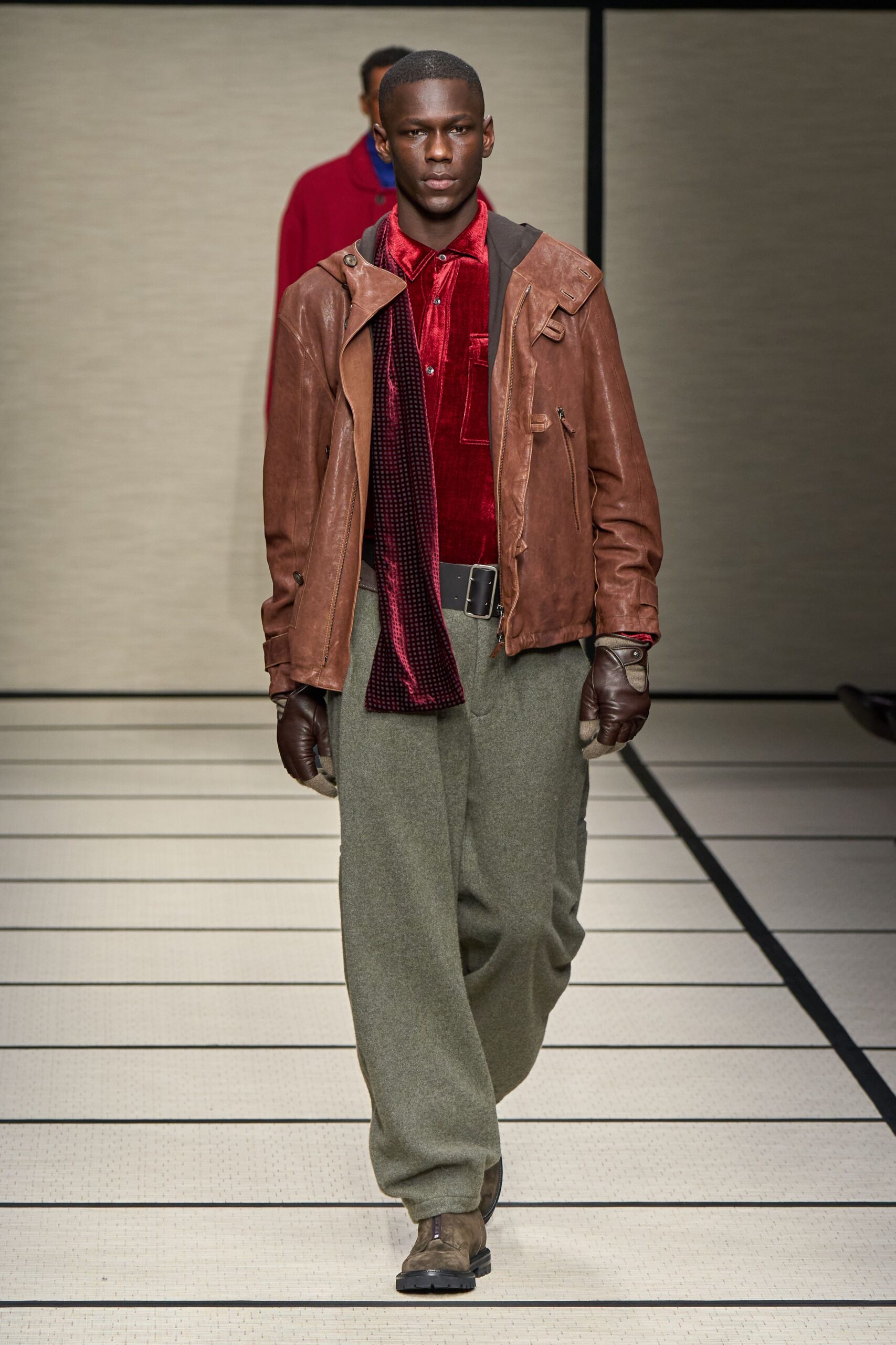 brown leather jacket with red shirt