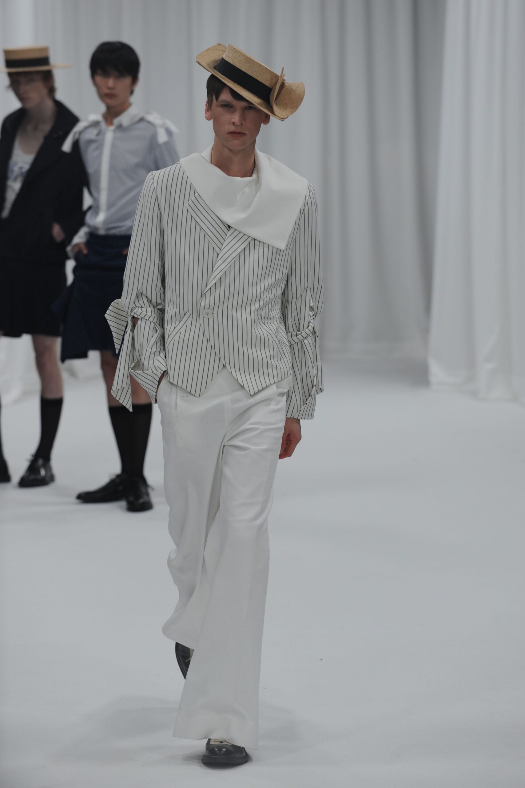 striped blazer and flared pants