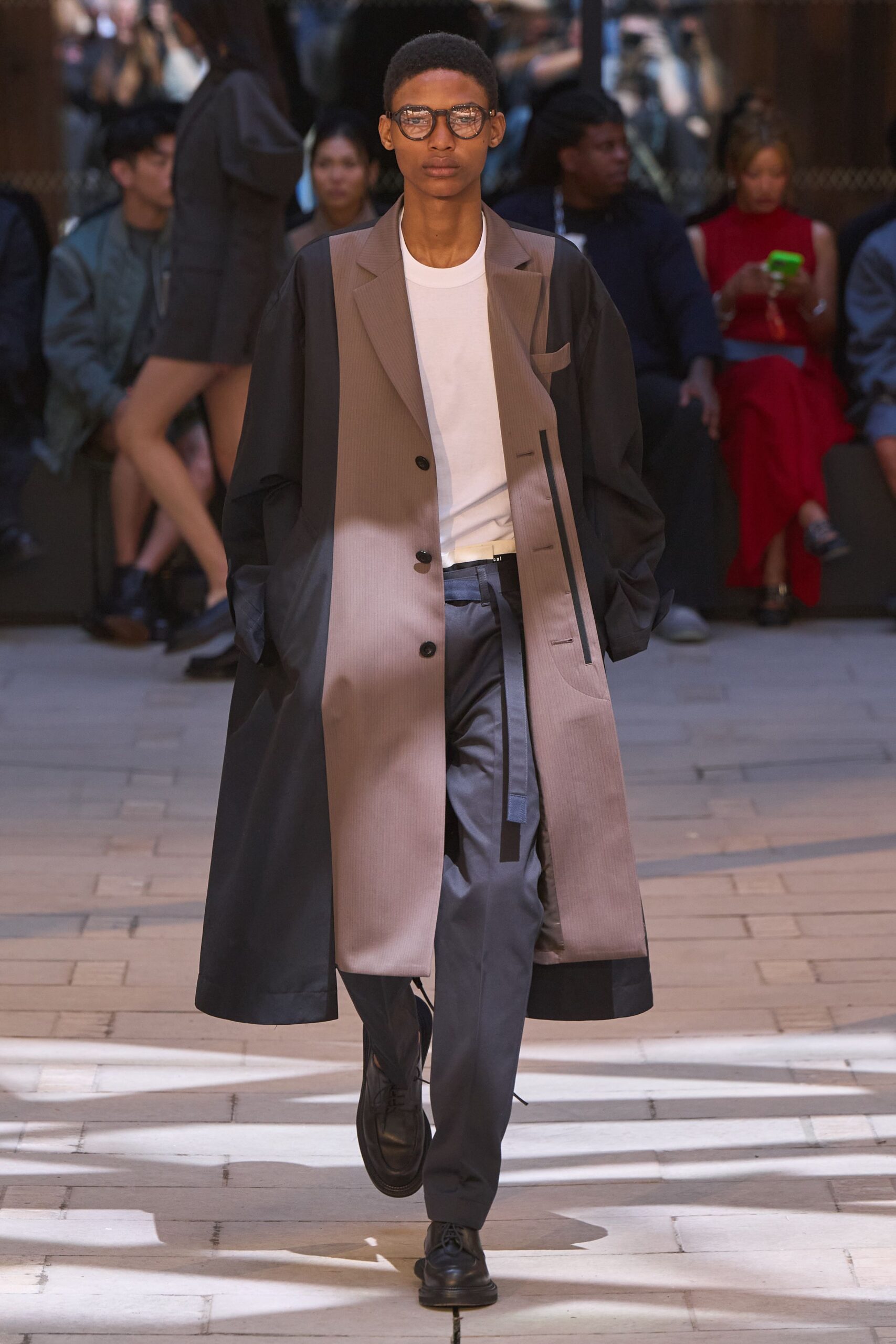 black cotton long-sleeve collared structured buttoned coat
