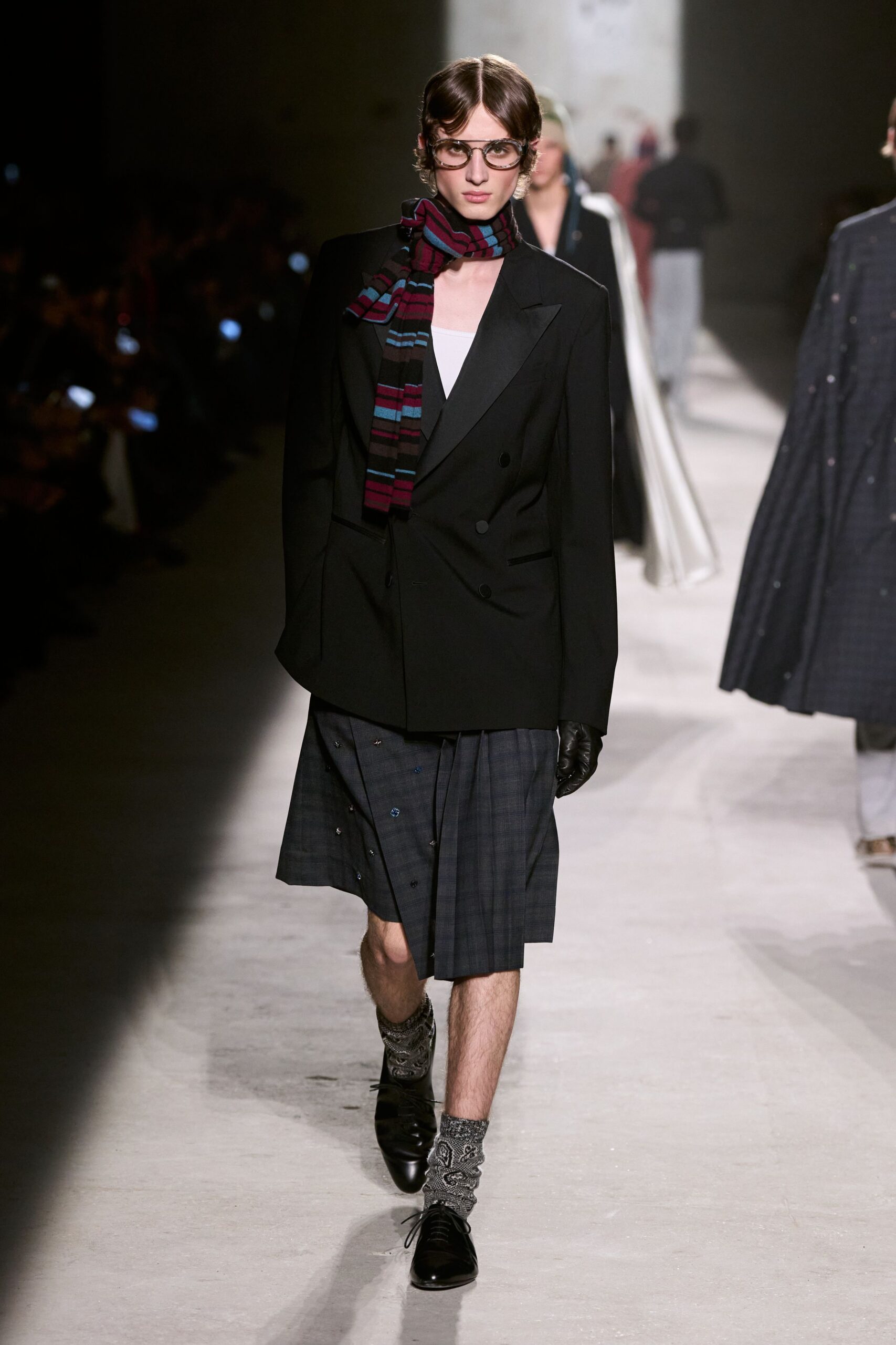 black tailored blazer with pleated skirt