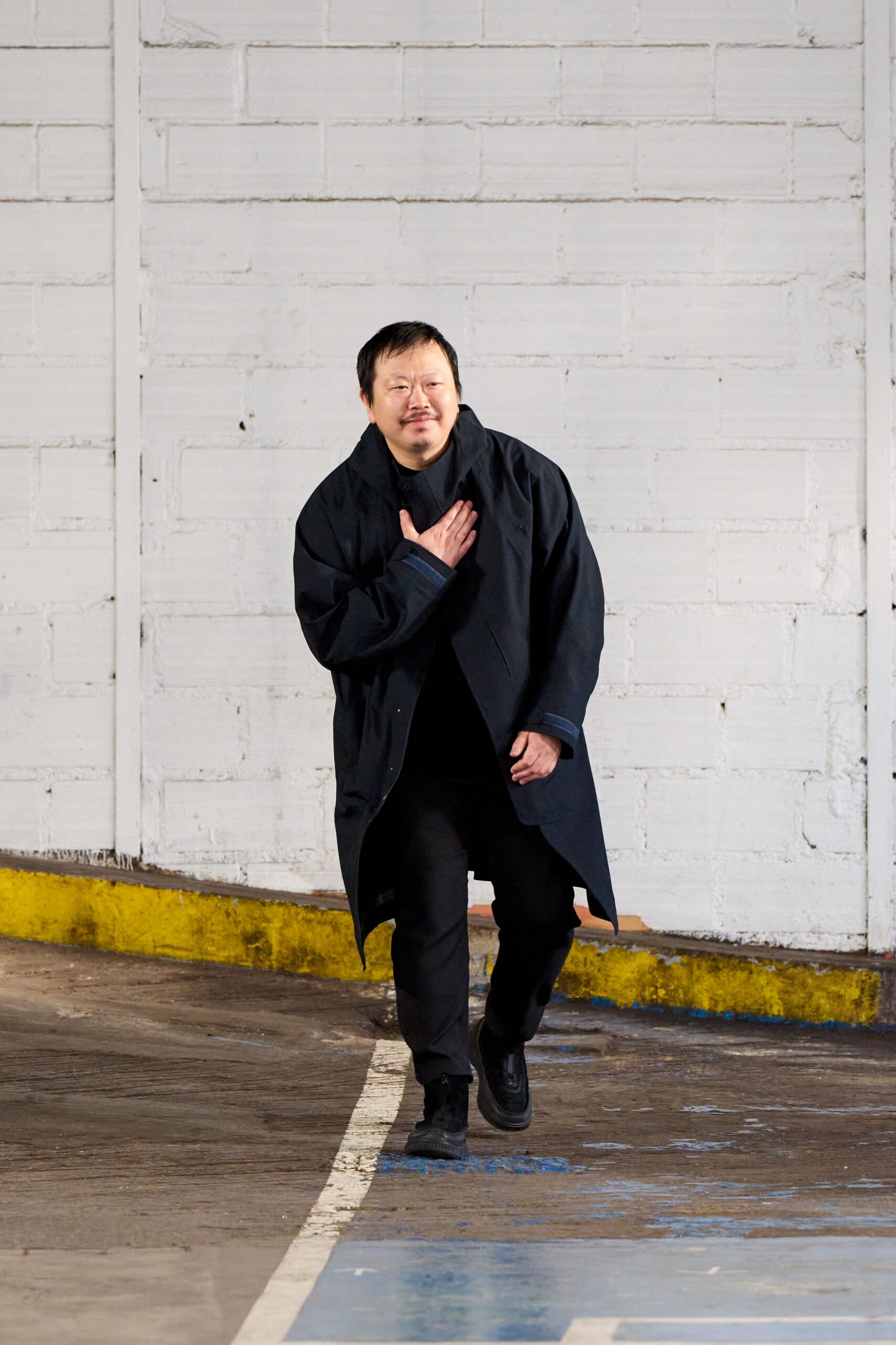 black wool coat with fitted pants