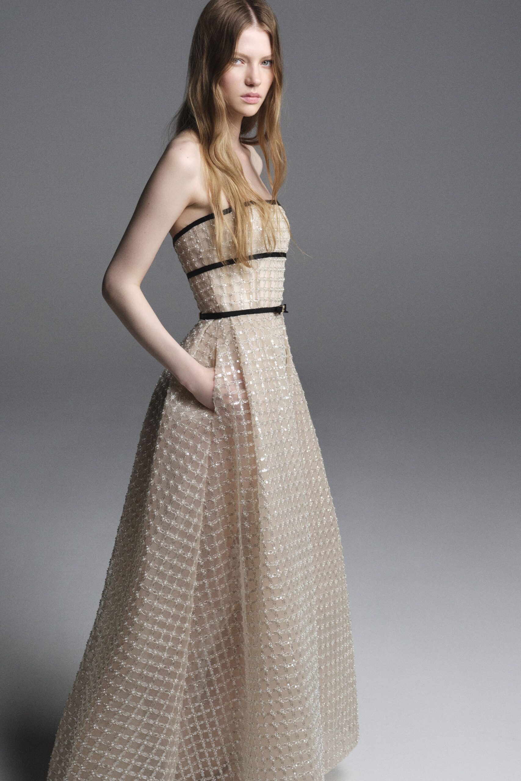 beige strapless pleated gown