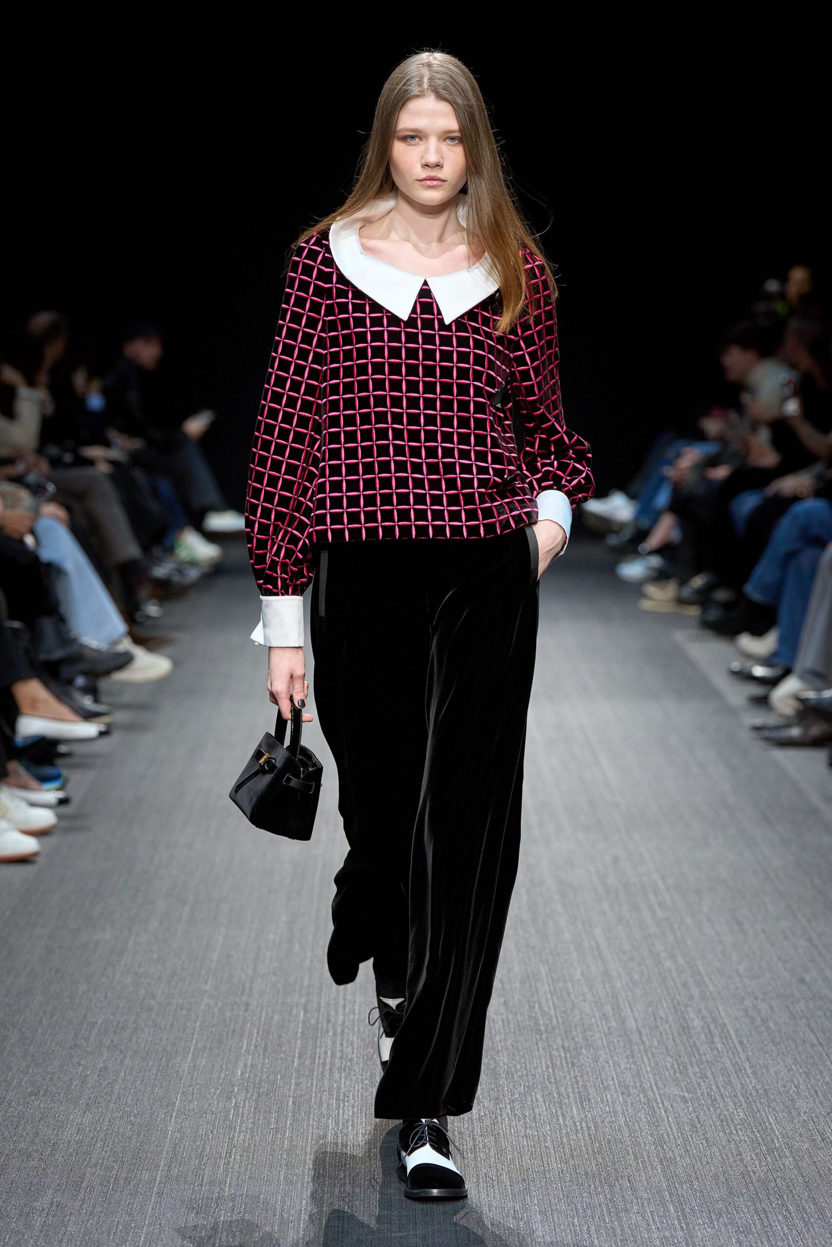 red and black velvet top with relaxed pants