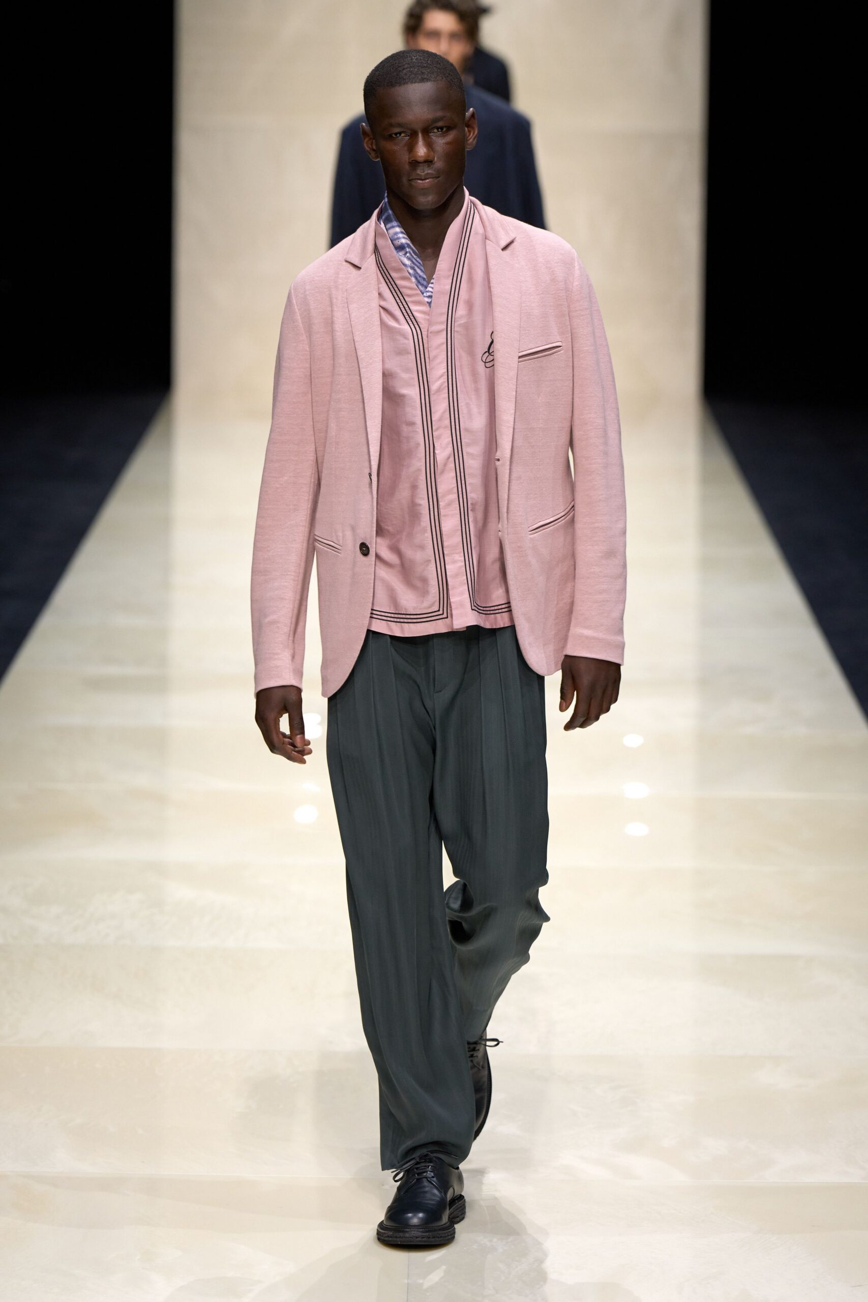 pink tailored blazer with gray pants