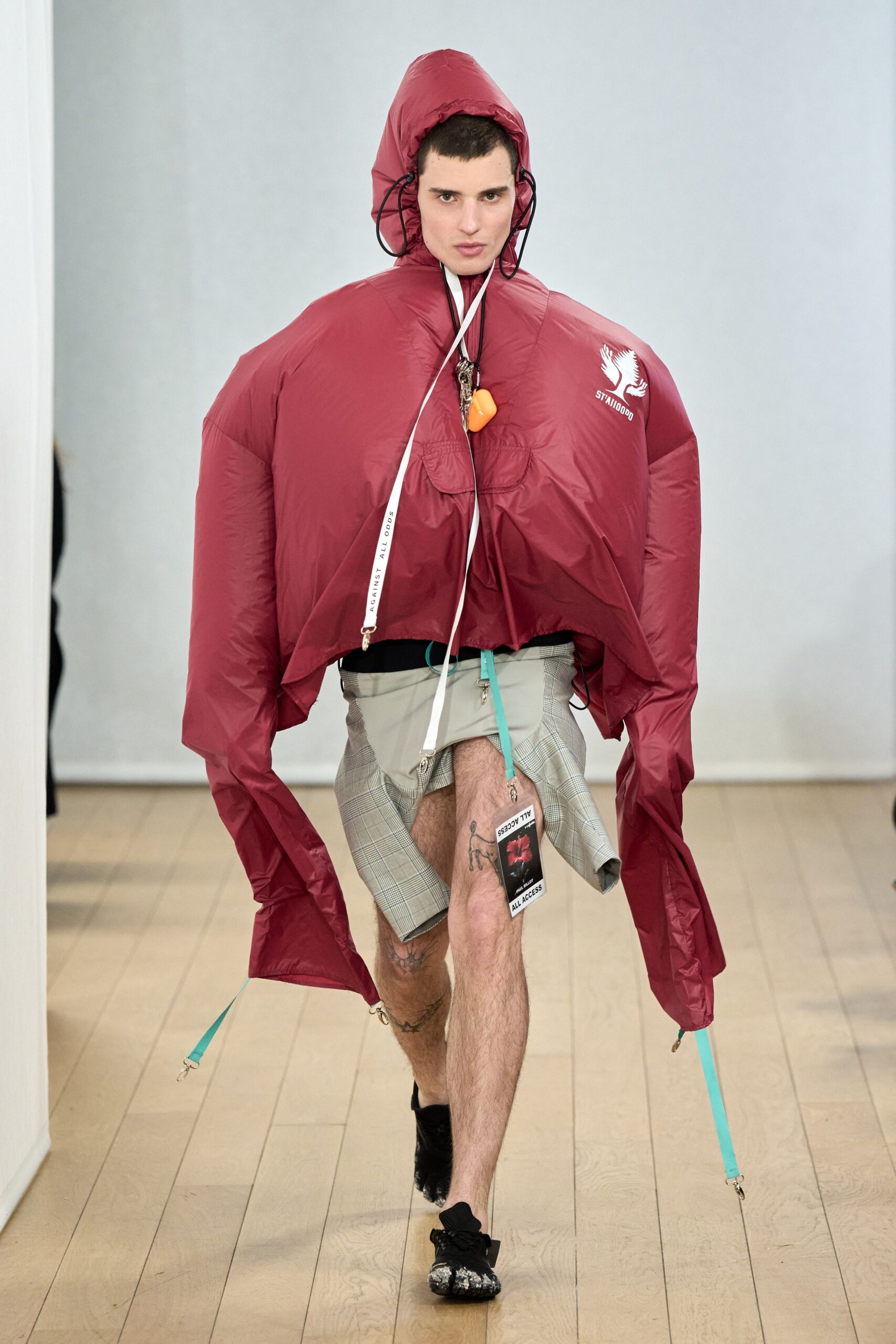 oversized red jacket with gray skirt