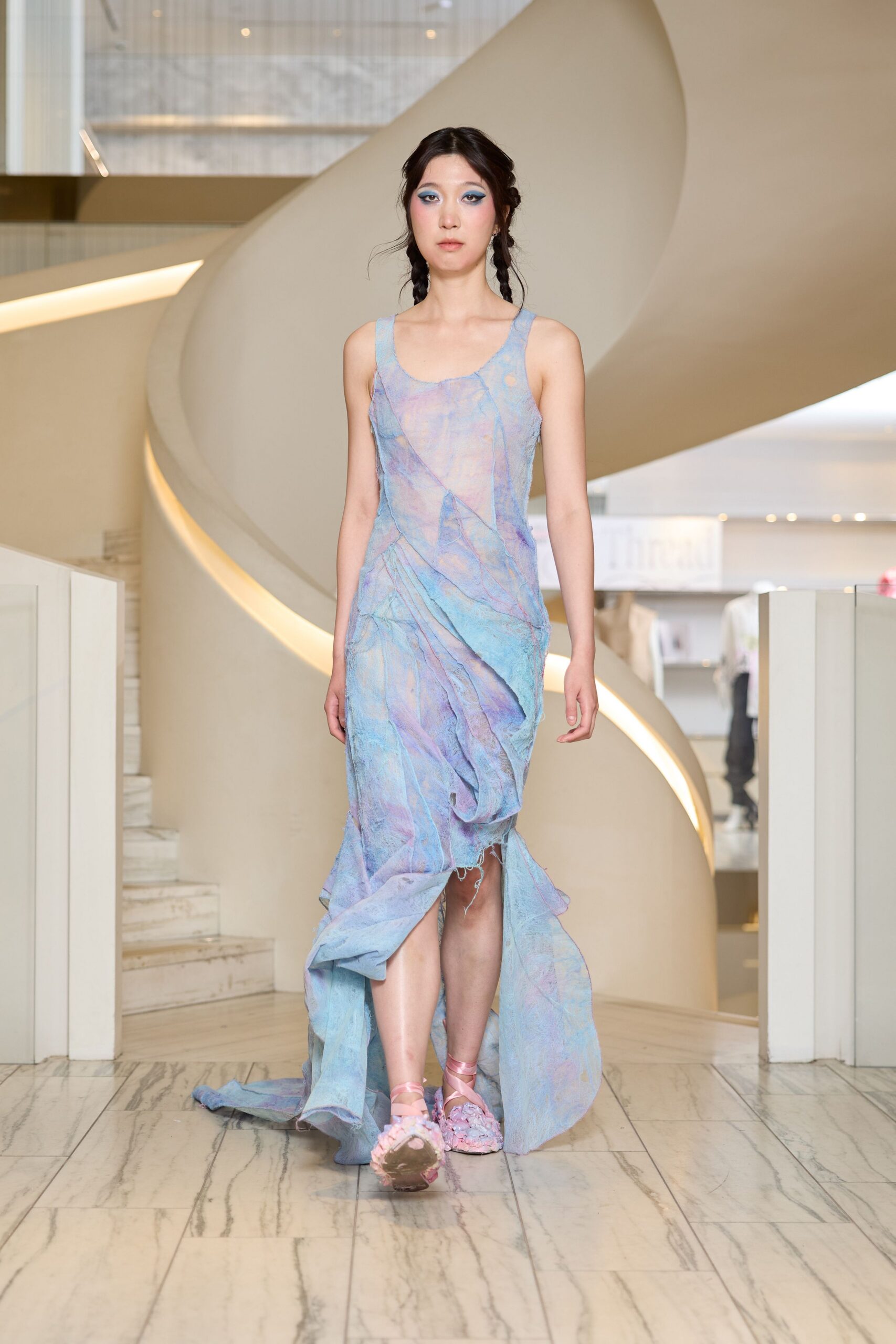 blue chiffon sleeveless v-neck fitted draped tiered gown