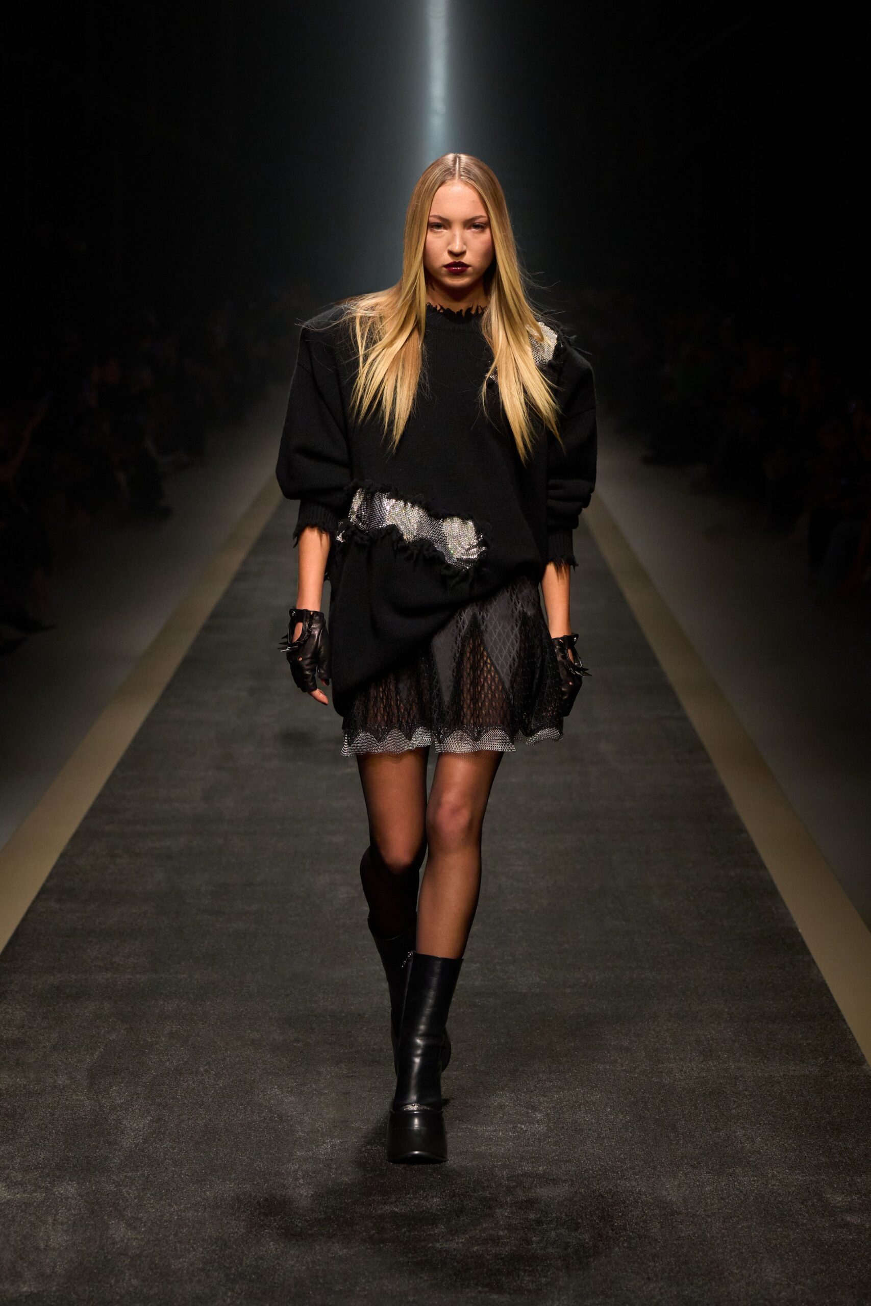 black oversized sweater with mini skirt