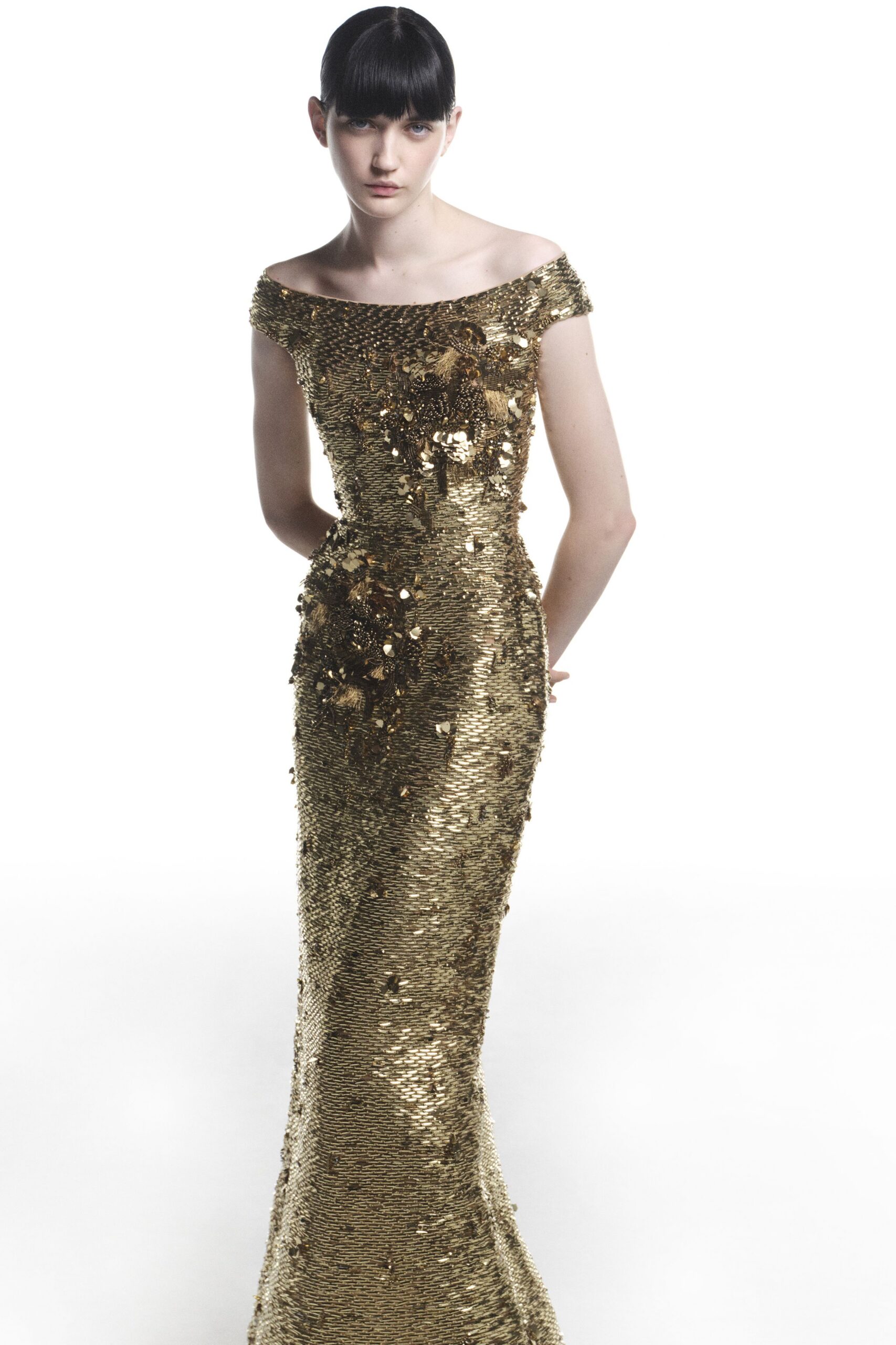 gold sequin off-shoulder gown