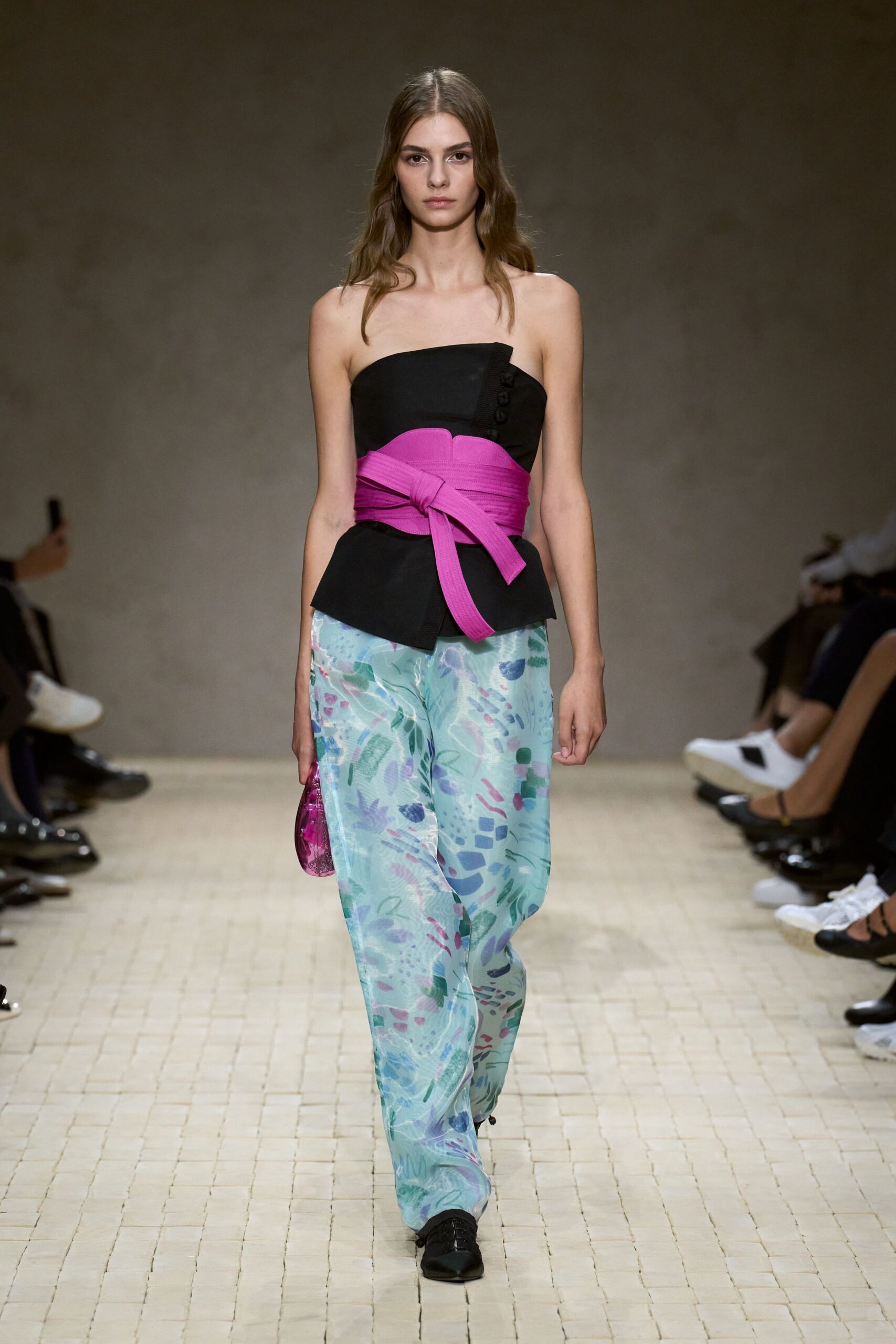 black strapless top with printed pants
