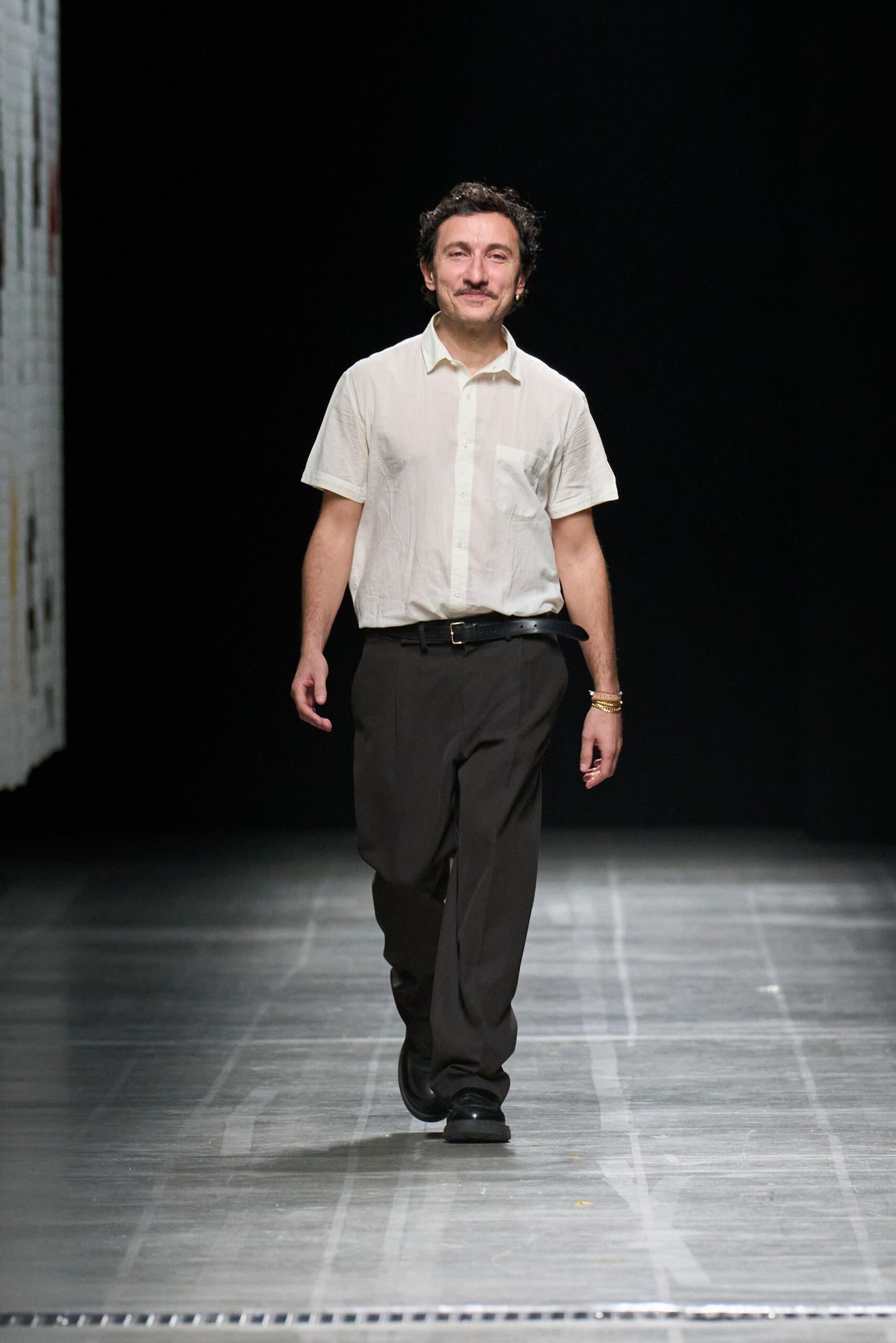 white relaxed shirt black pants