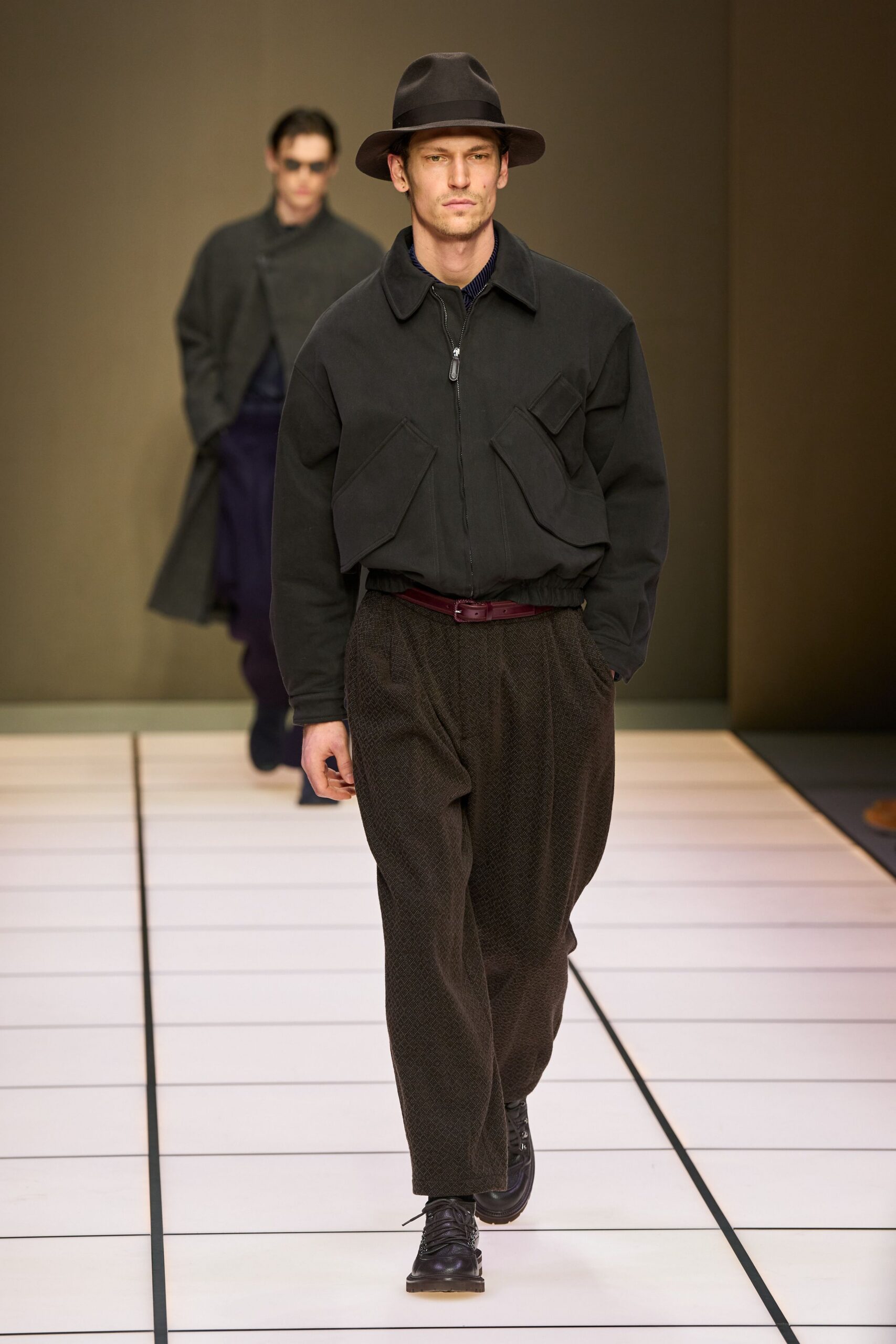 black jacket brown pants