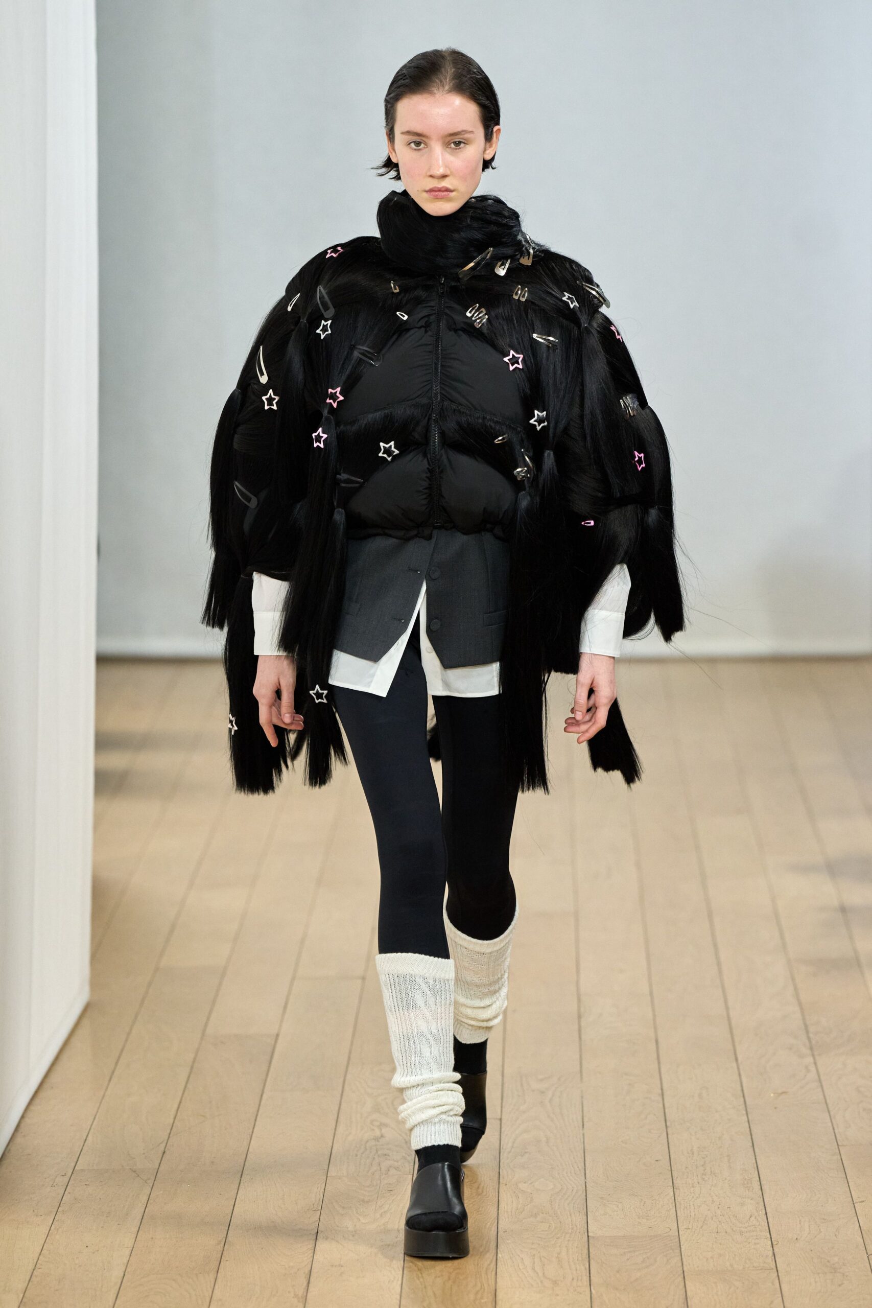 black faux-fur coat with white shirt
