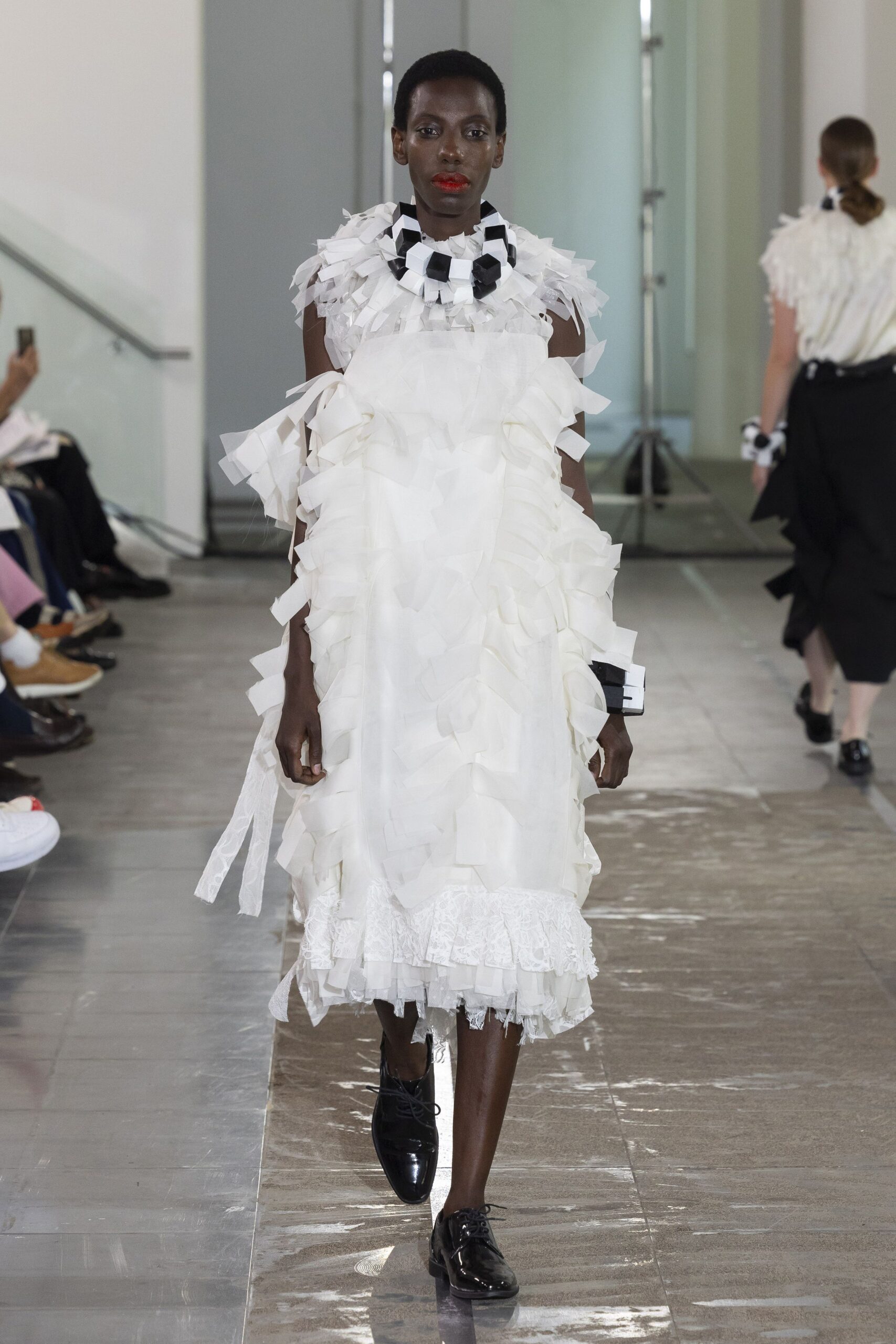 white ruffled midi dress with black shoes