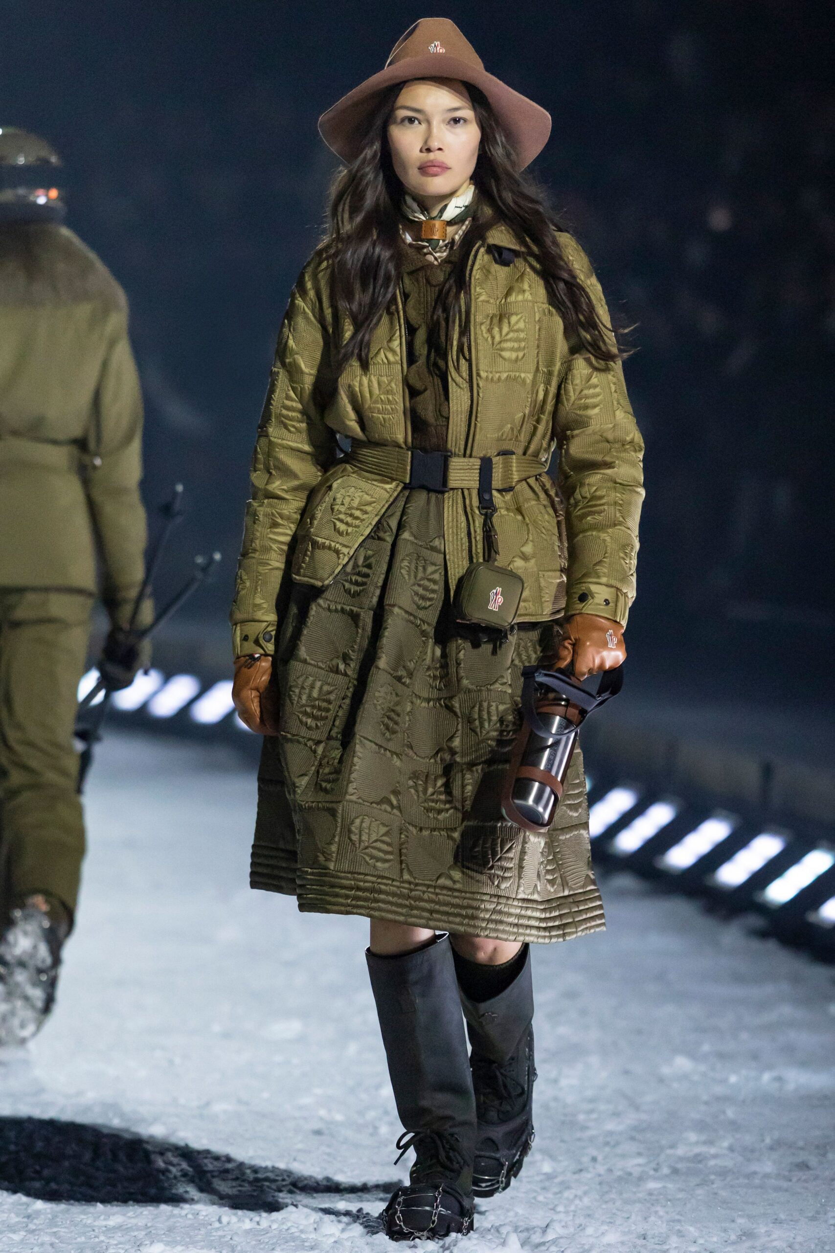 green quilted coat with hat and boots