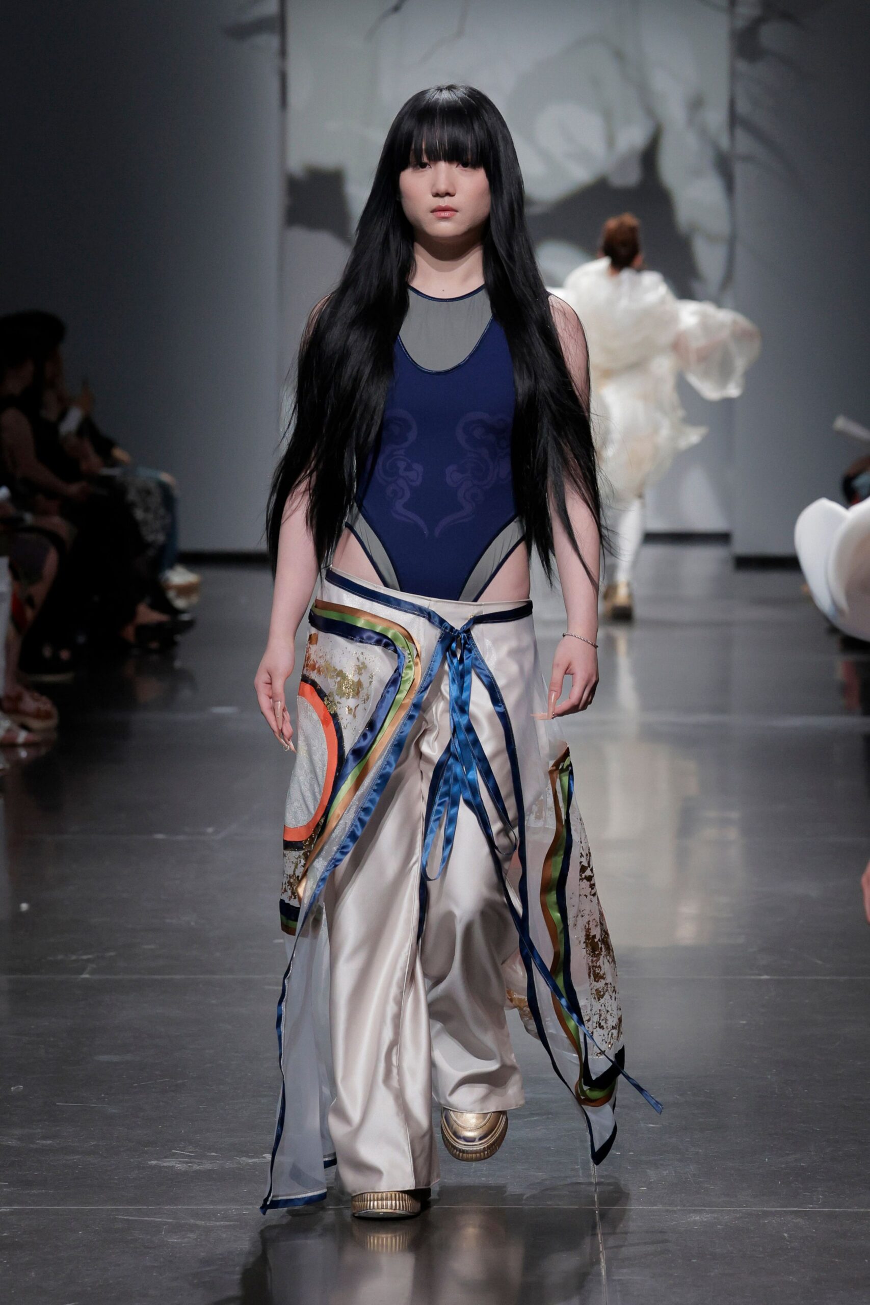 blue fitted top with wide-leg pants