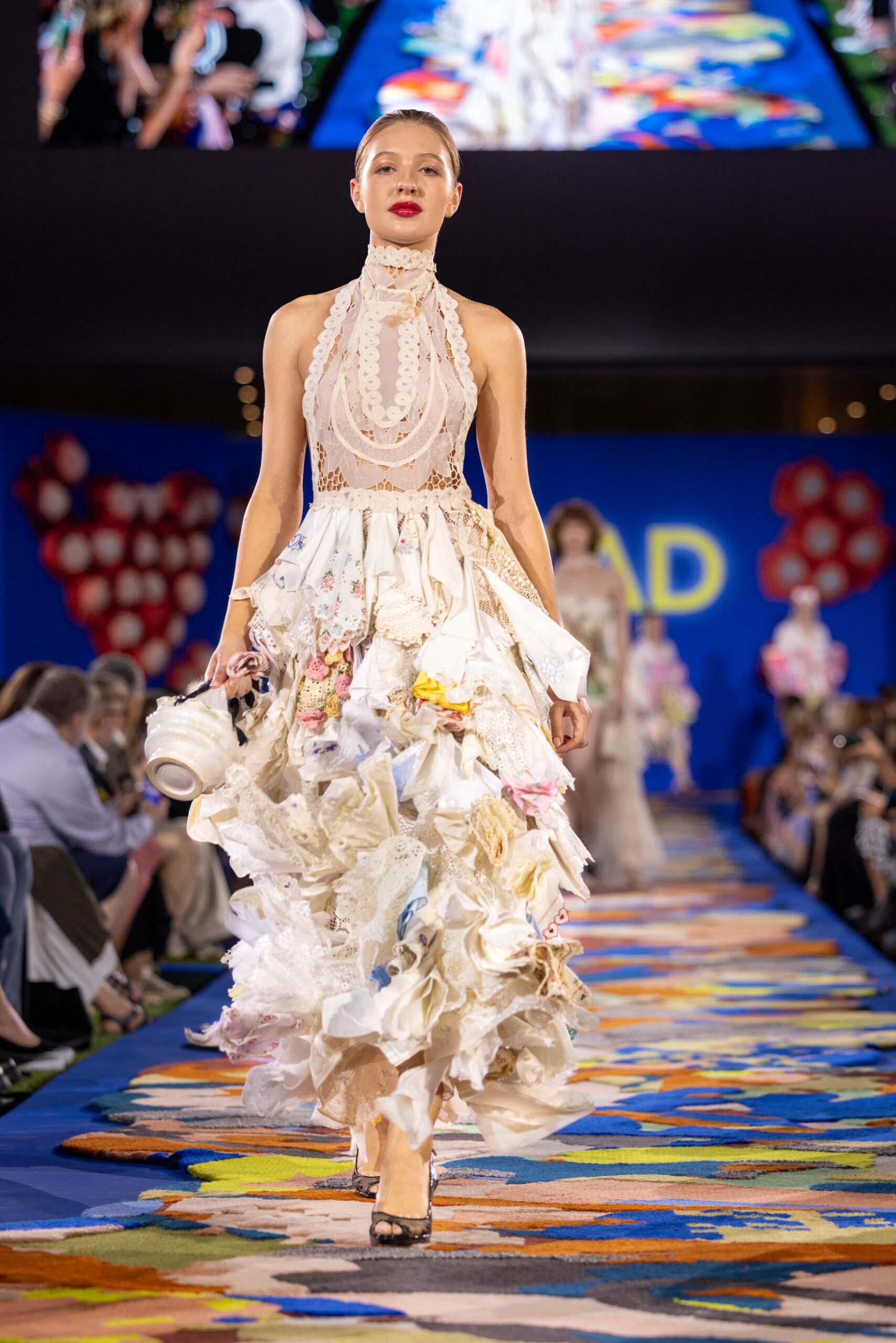 white layered gown with black shoes