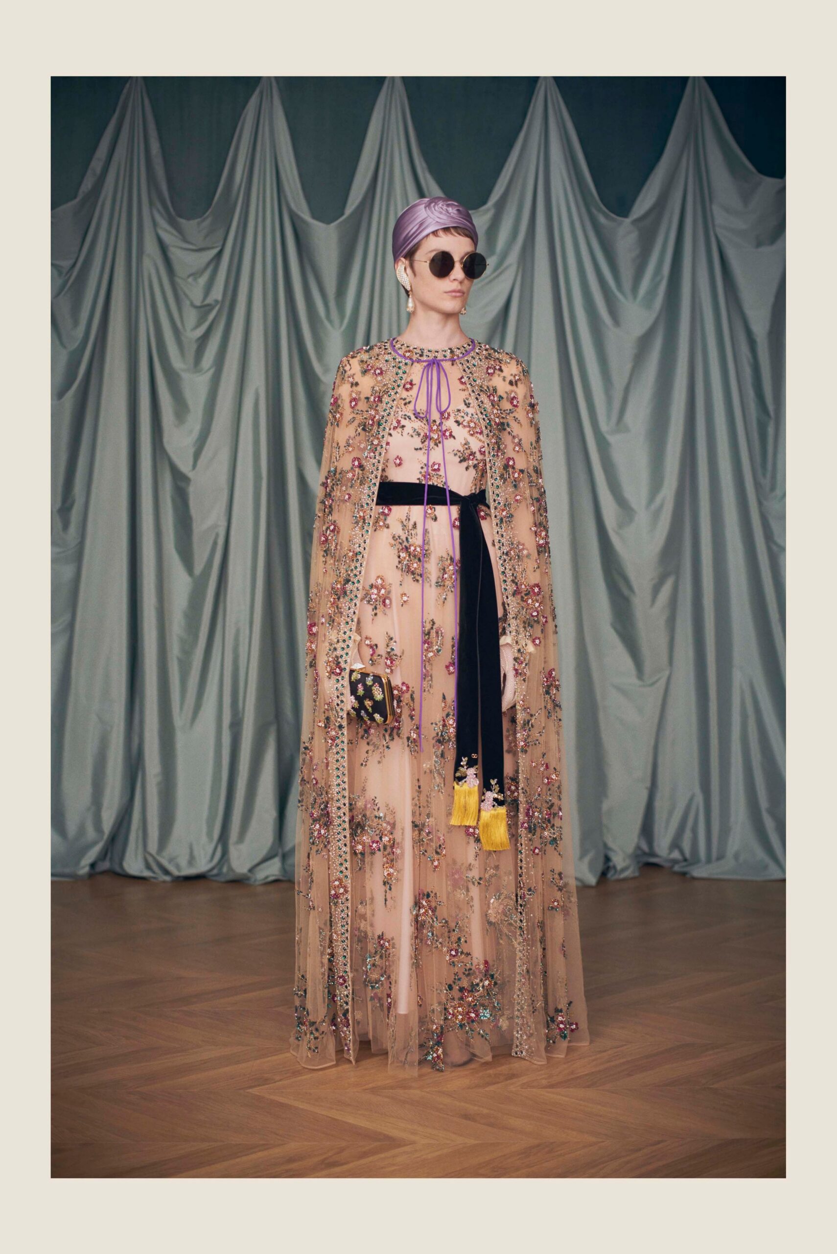 beige embroidered gown with cape
