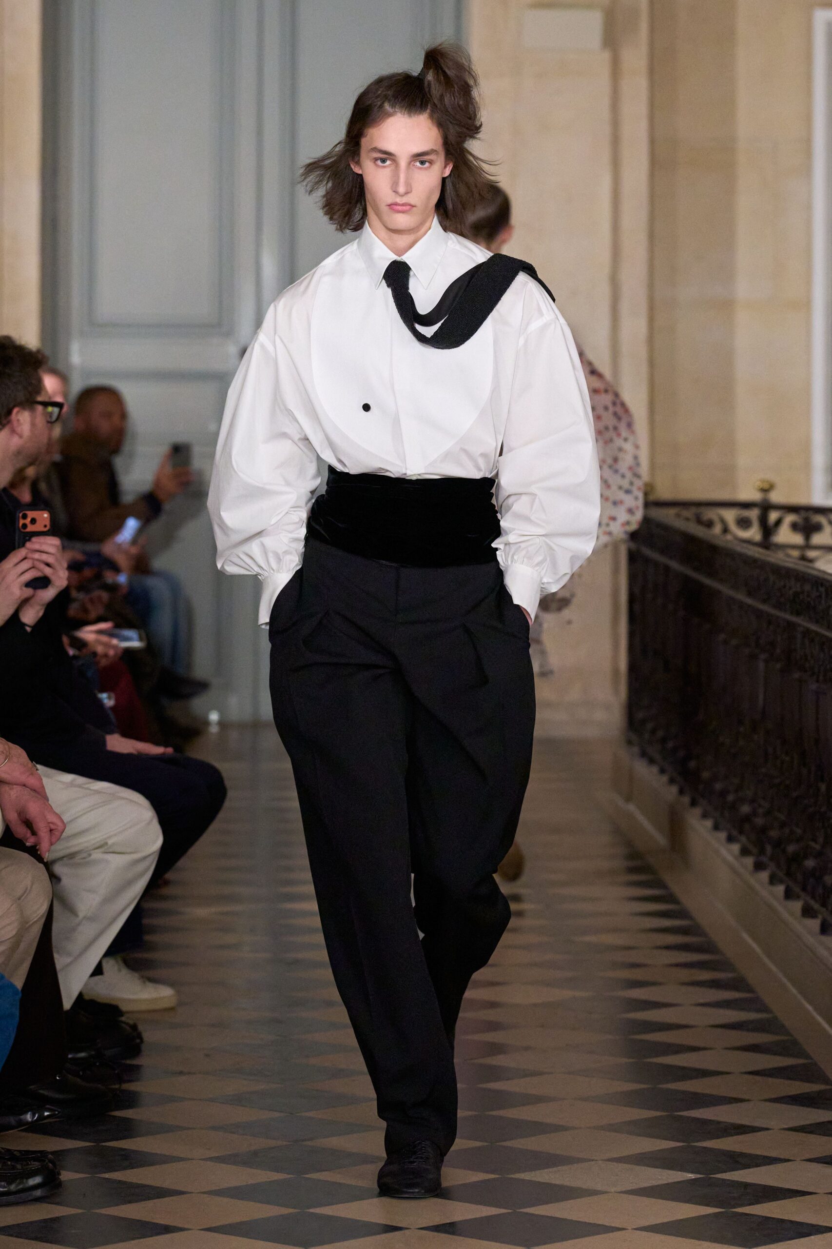 white relaxed shirt with black tailored pants