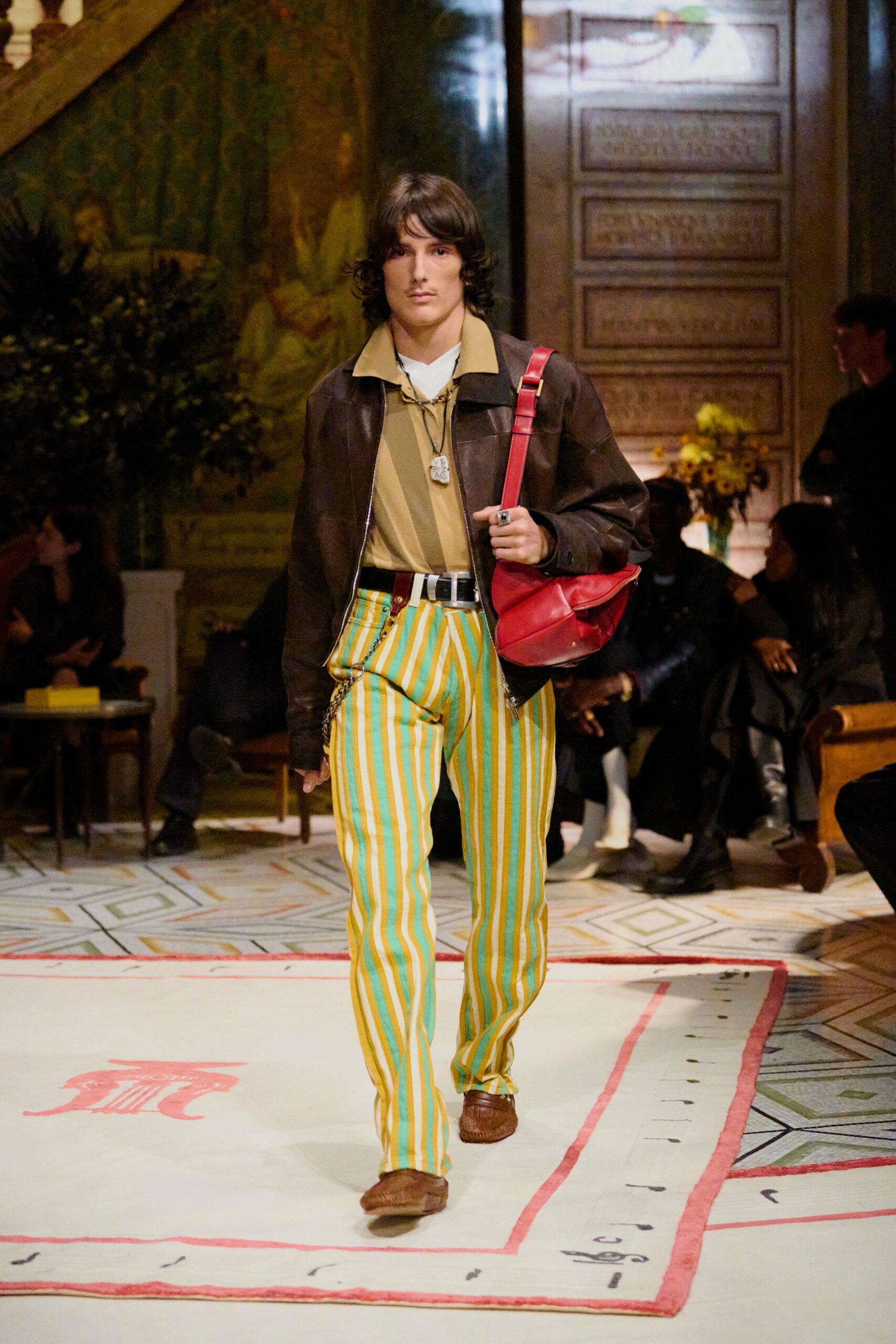 brown leather jacket beige shirt yellow green striped pants