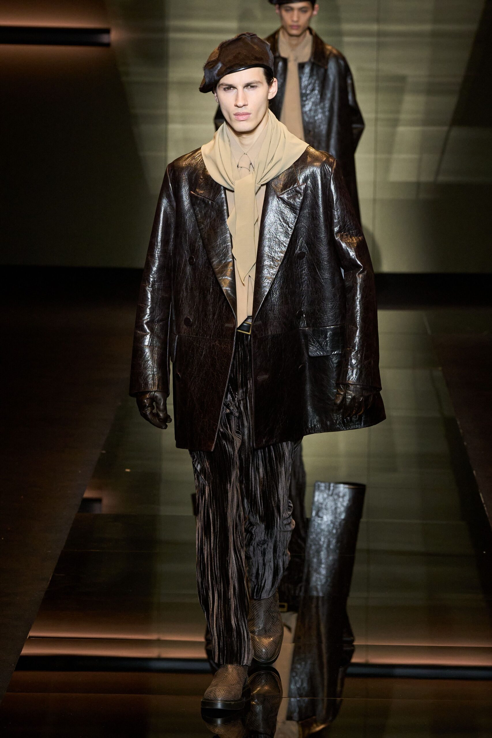 black leather long-sleeve oversized textured coat