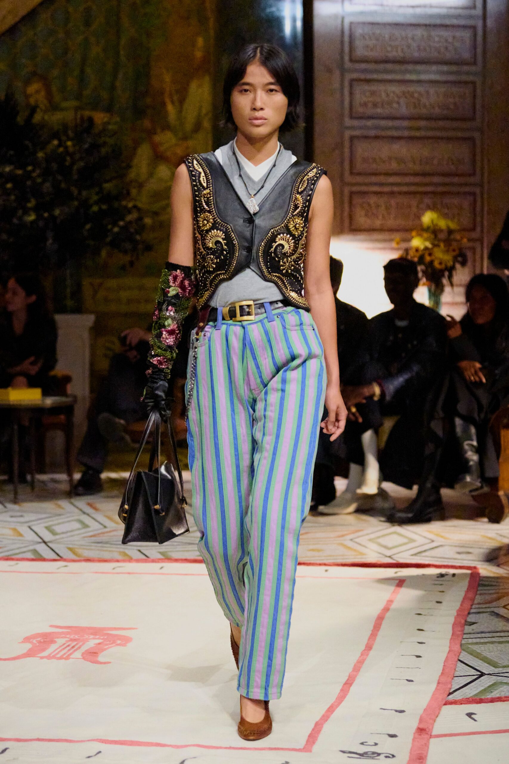 black embroidered vest with striped pants