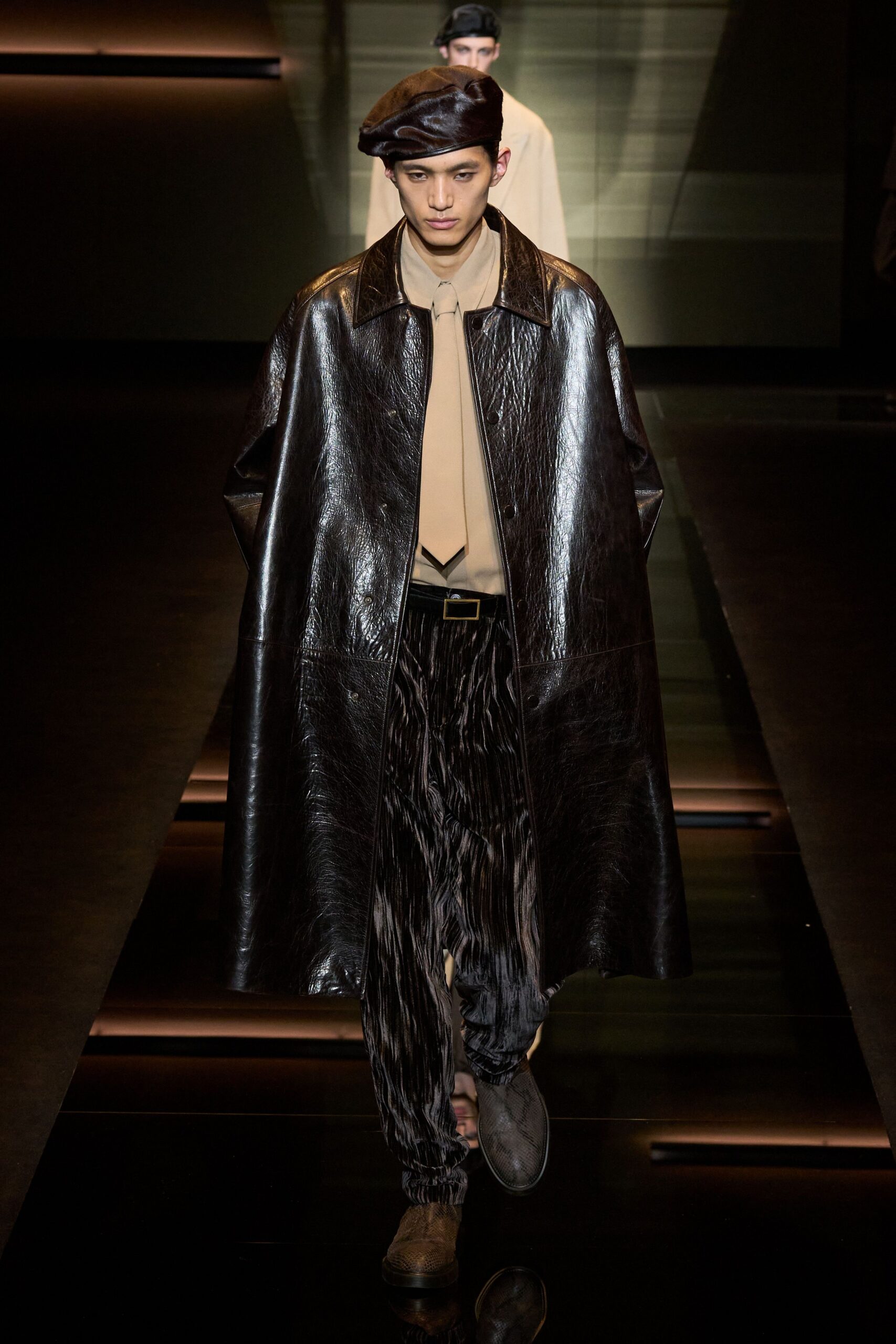 black leather coat beige shirt