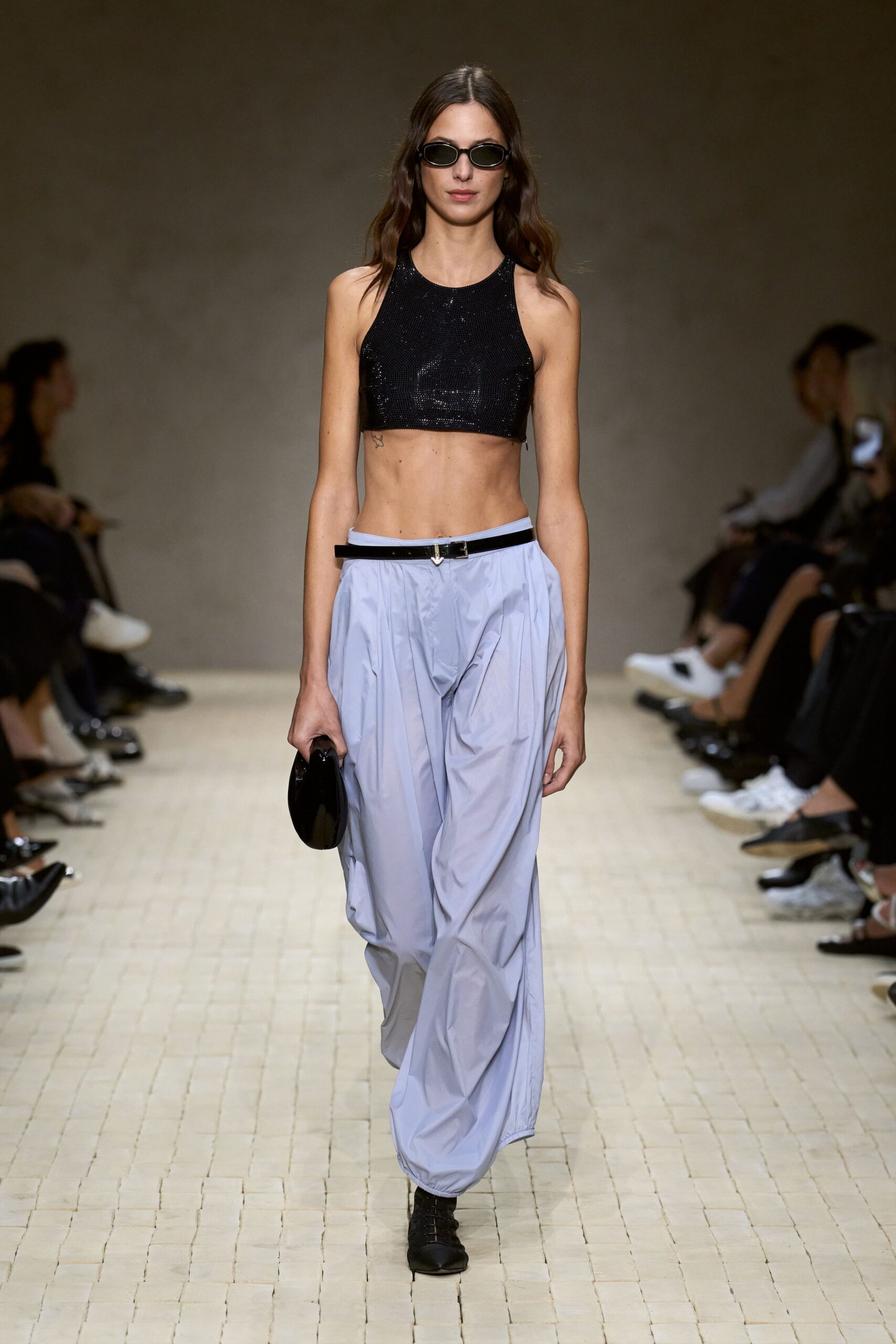 black crop-top with light blue pants