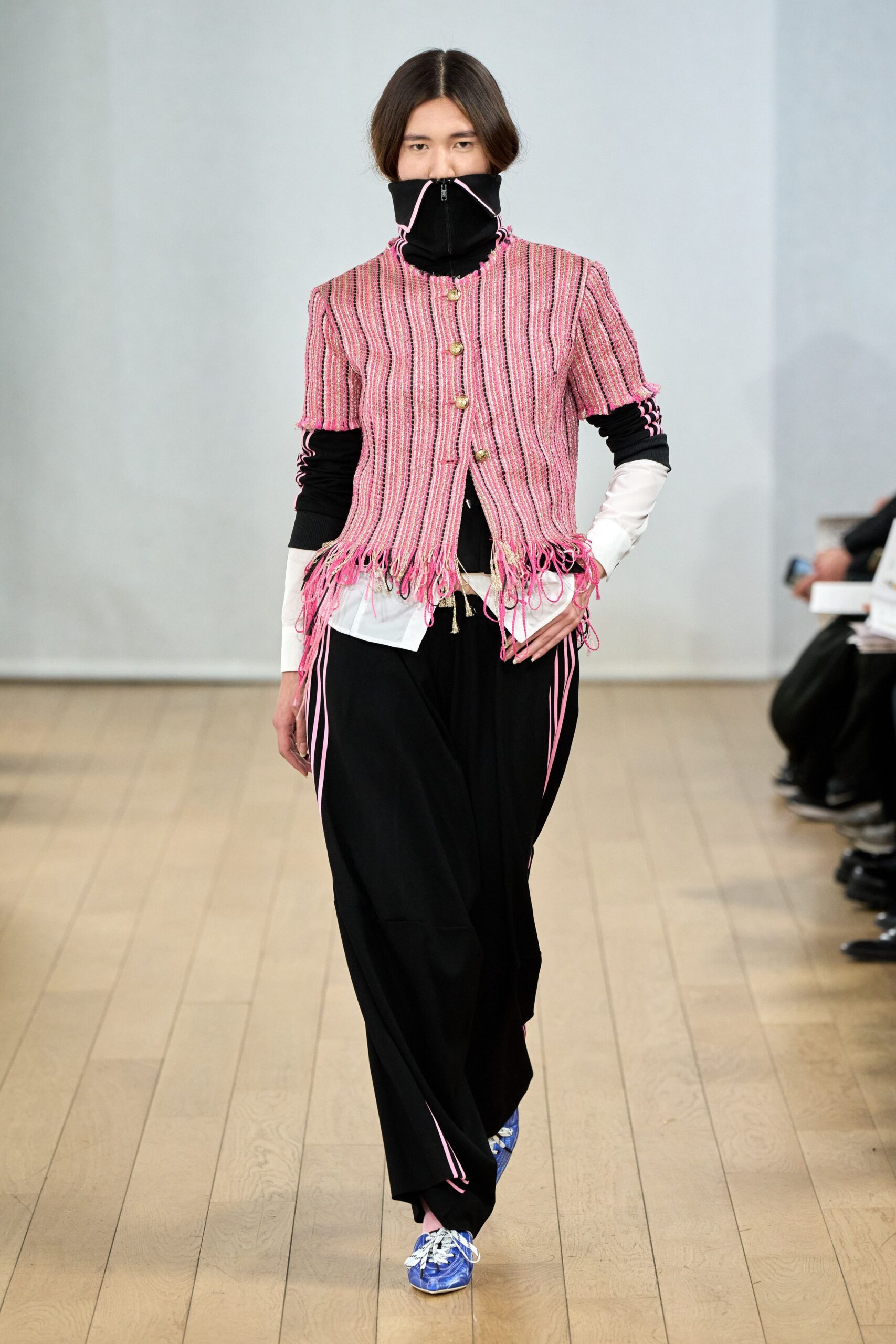 pink relaxed jacket with black pants