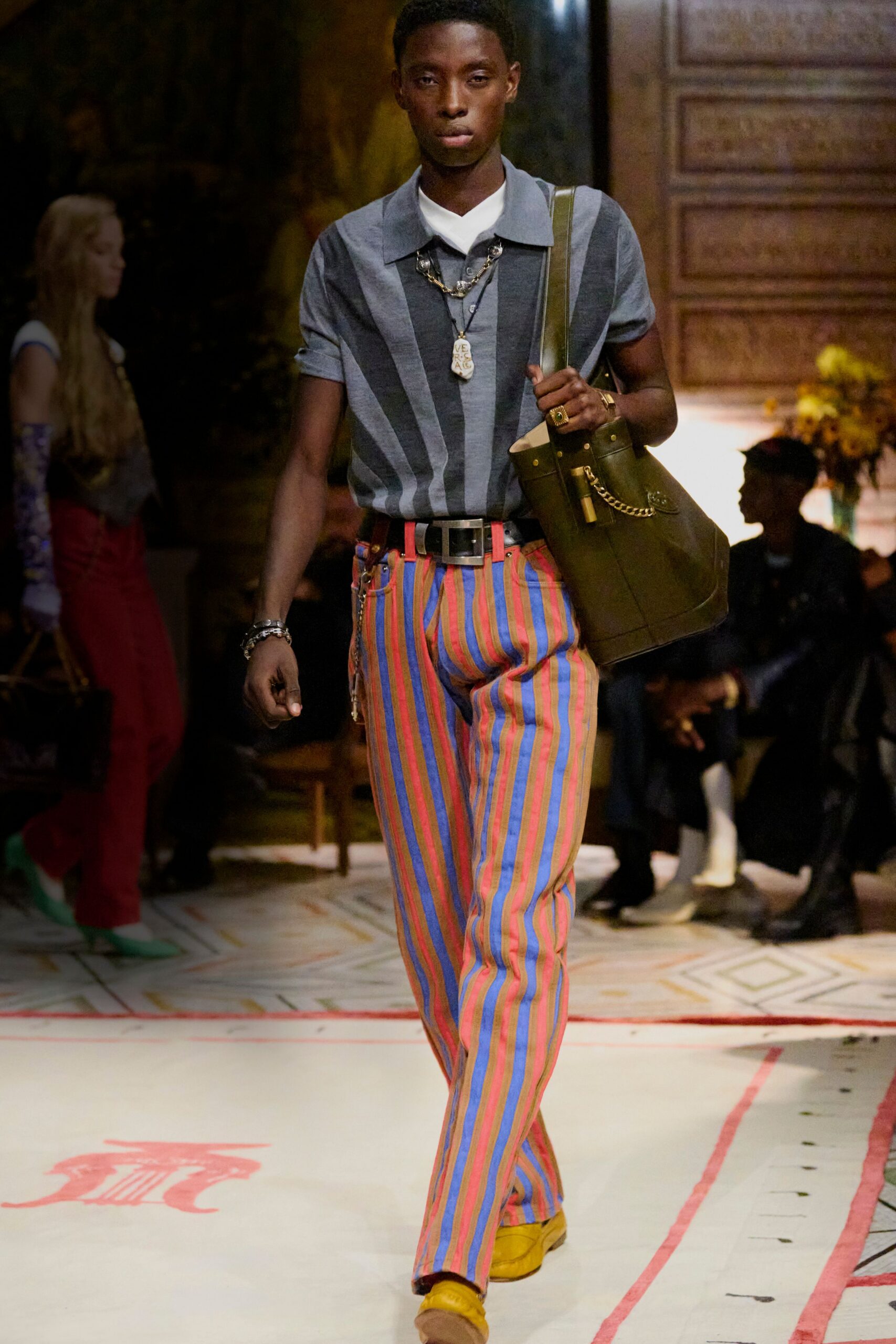 striped shirt and pants with yellow shoes